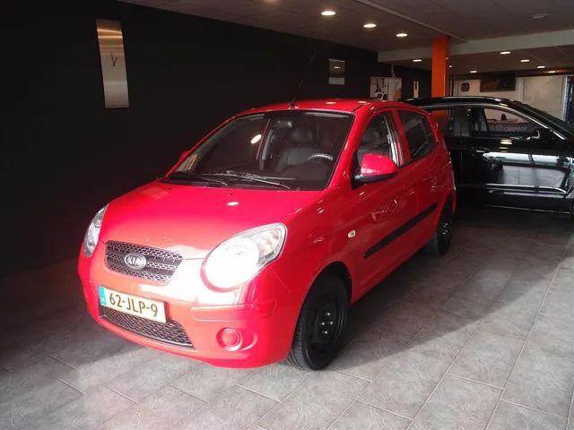 Kia Picanto (2009) — foto 1