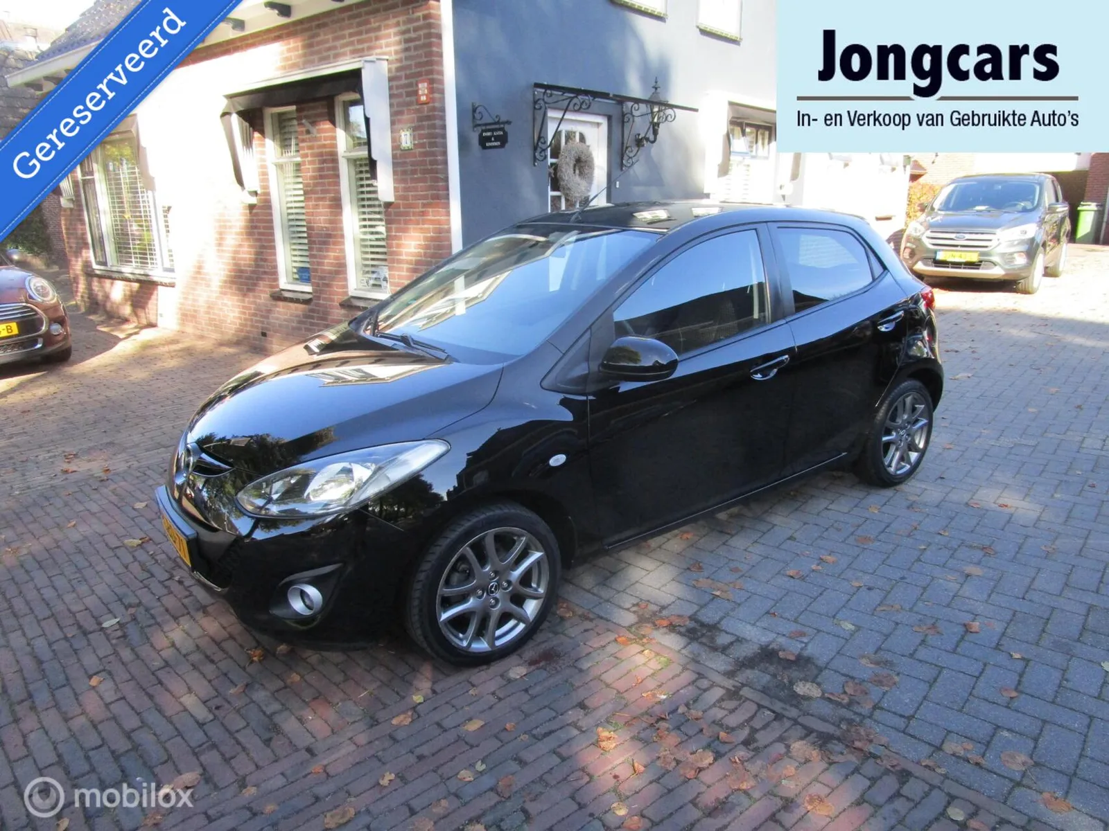 Mazda 2 (2013) — foto 1