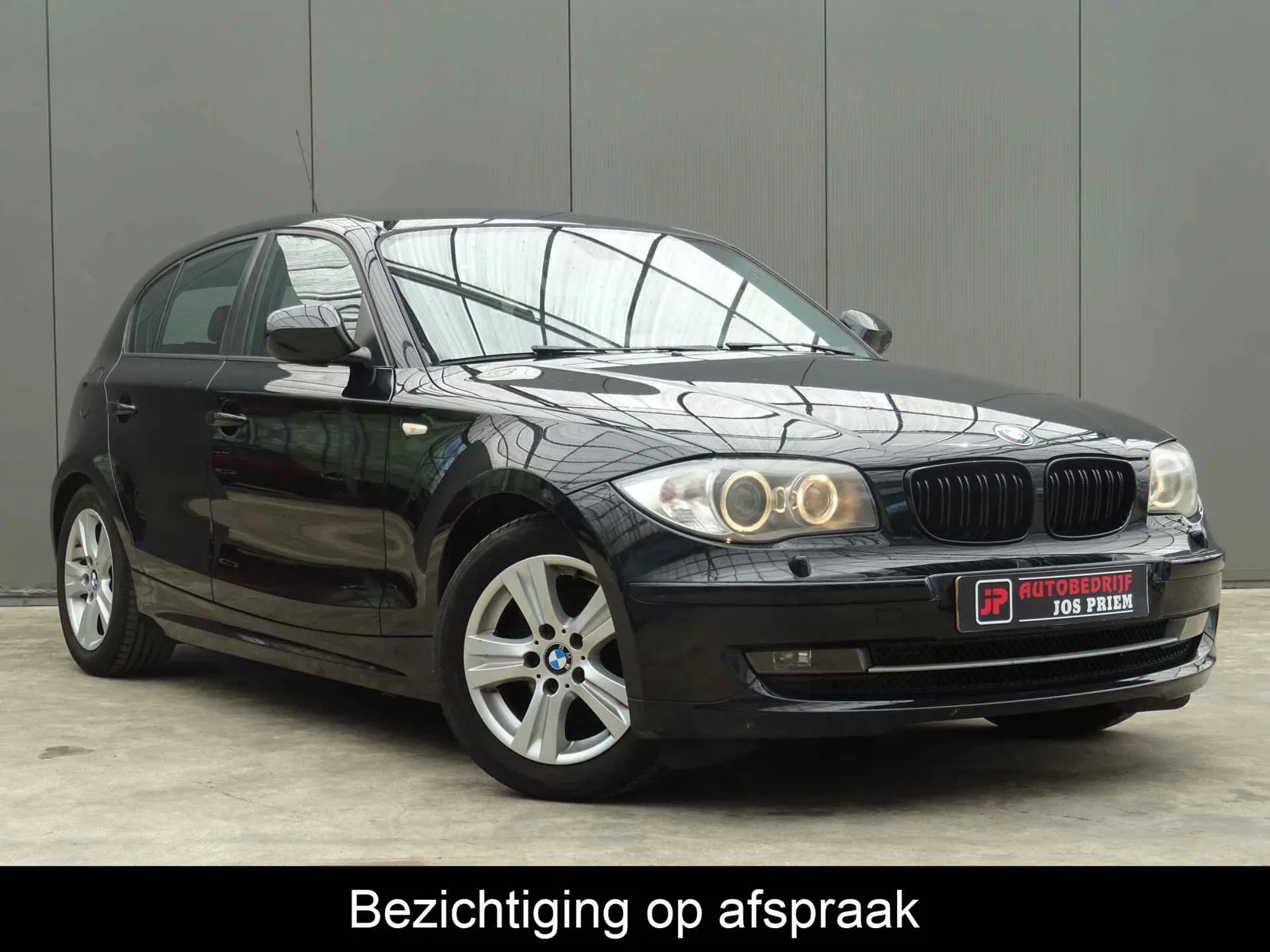 BMW 1-Serie (2011) — foto 1