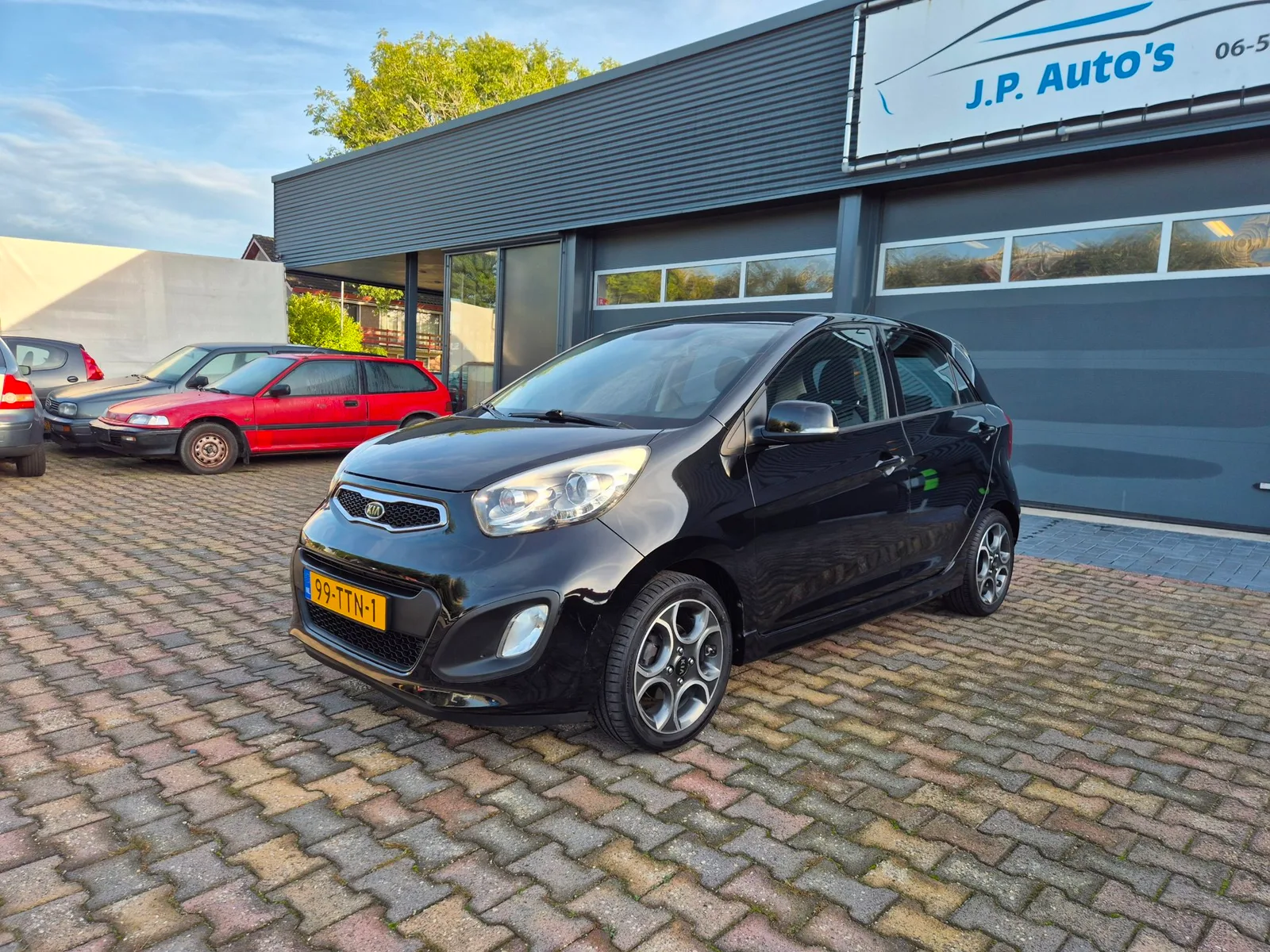 Kia Picanto (2012) — foto 1