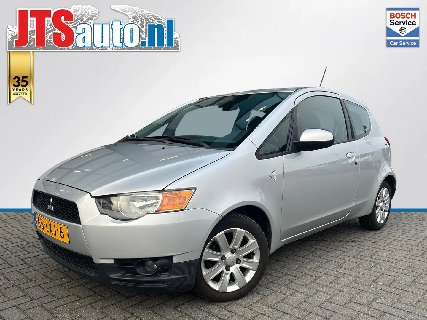 Mitsubishi Colt (2010) — foto 1
