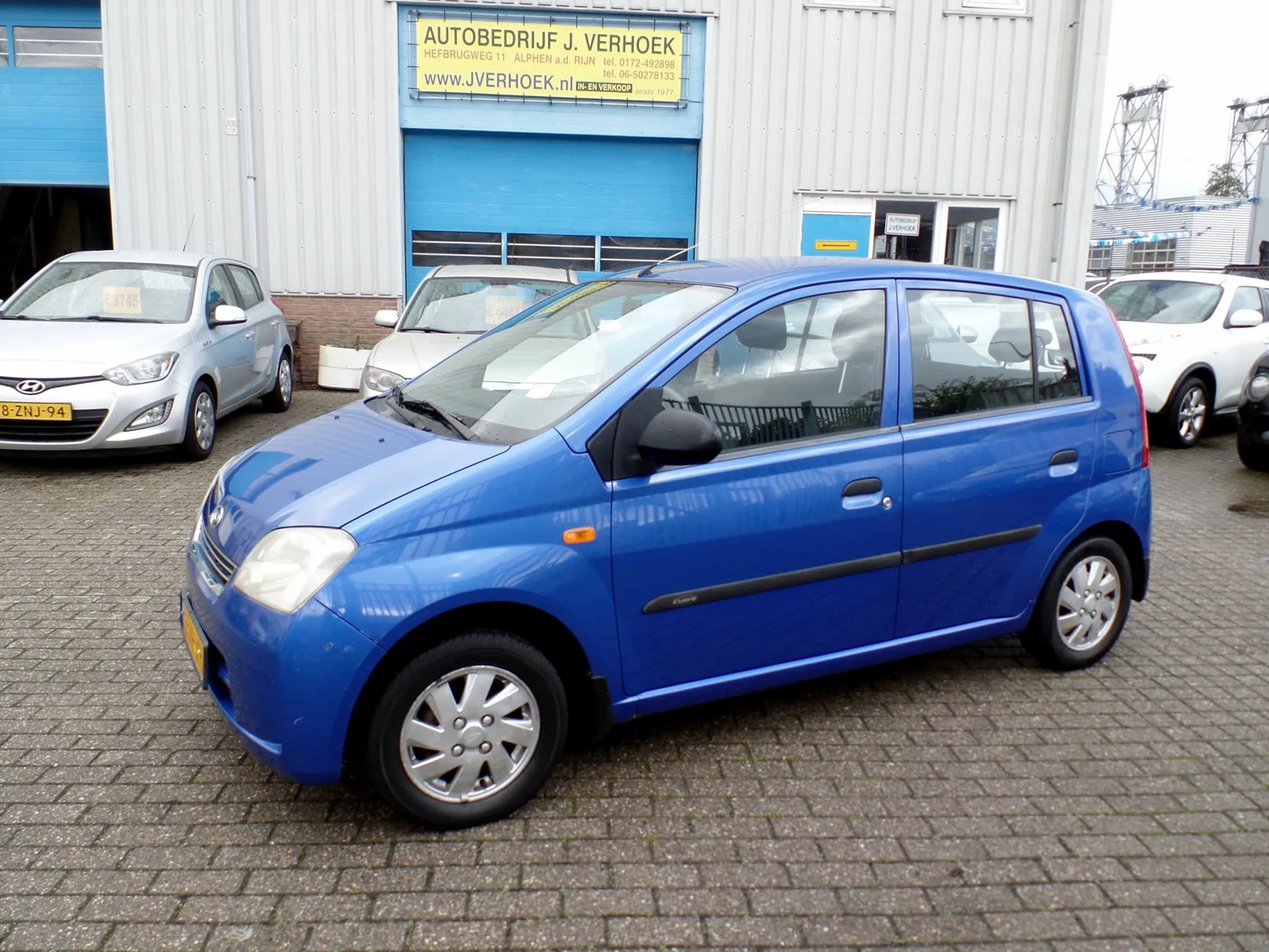 Daihatsu Cuore (2004) — foto 1