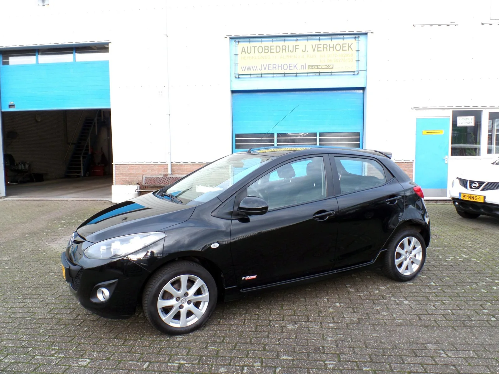 Mazda 2 (2011) — foto 1