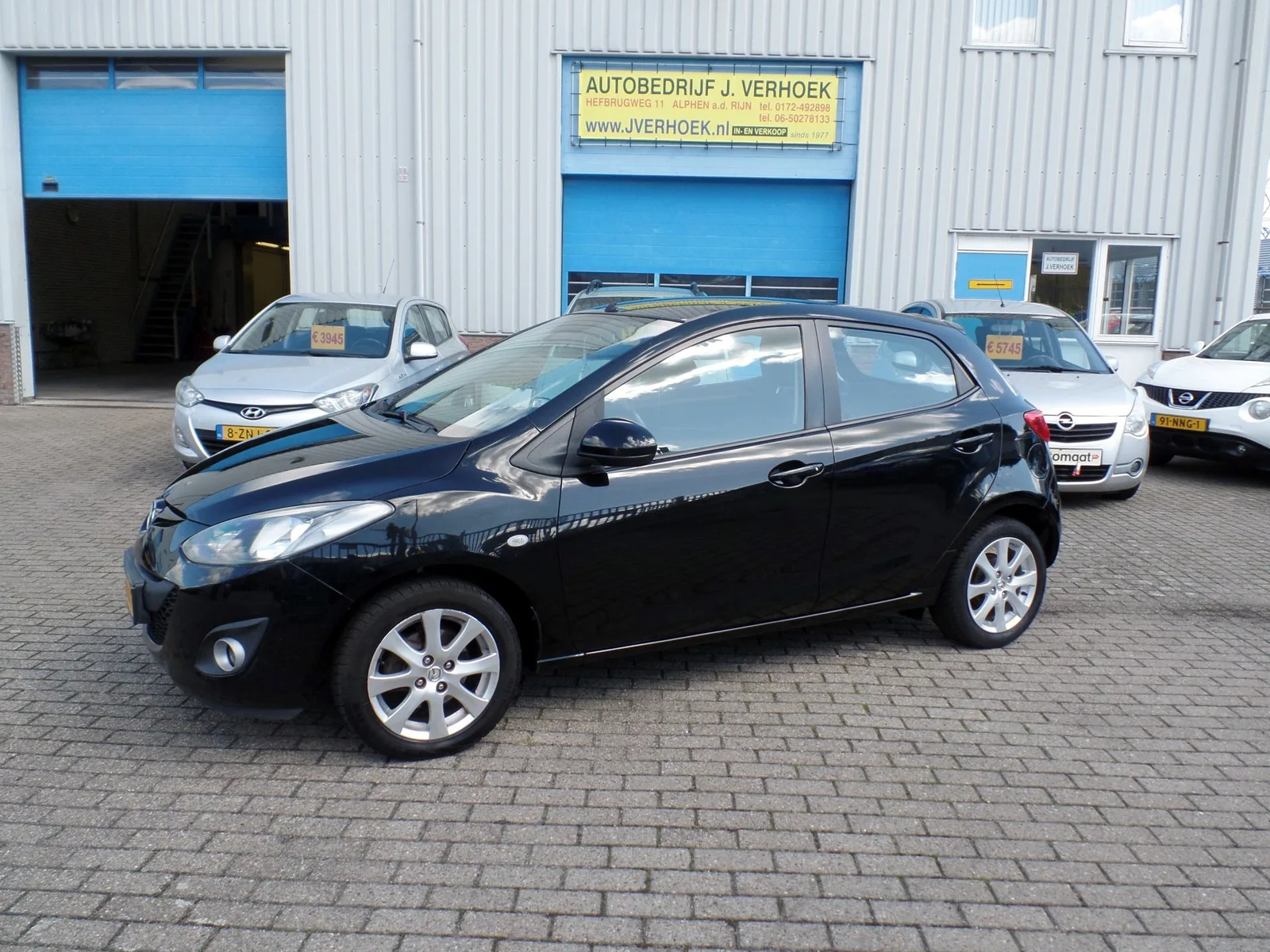 Mazda 2 (2011) — foto 1