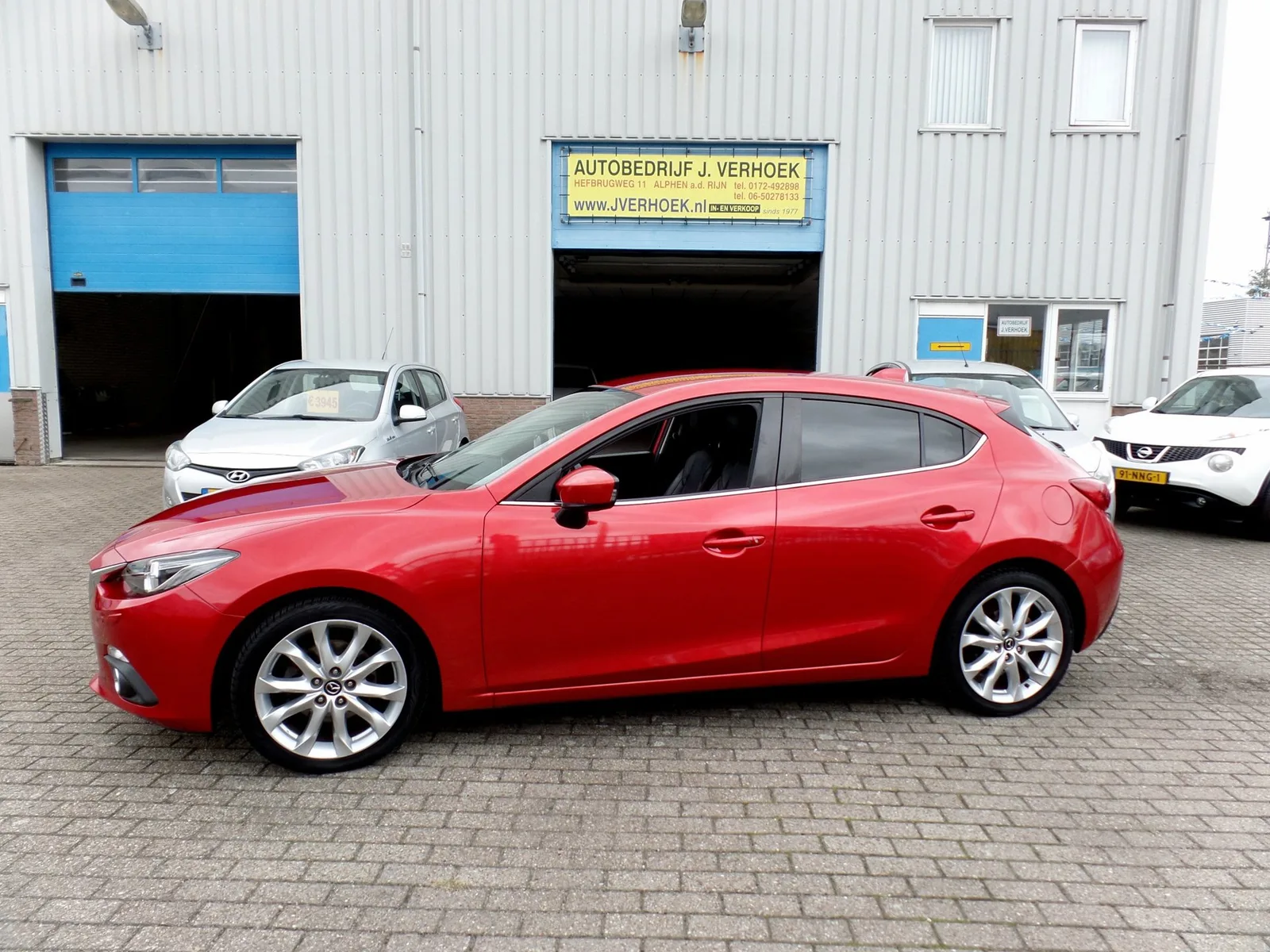Mazda 3 (2014) — foto 1