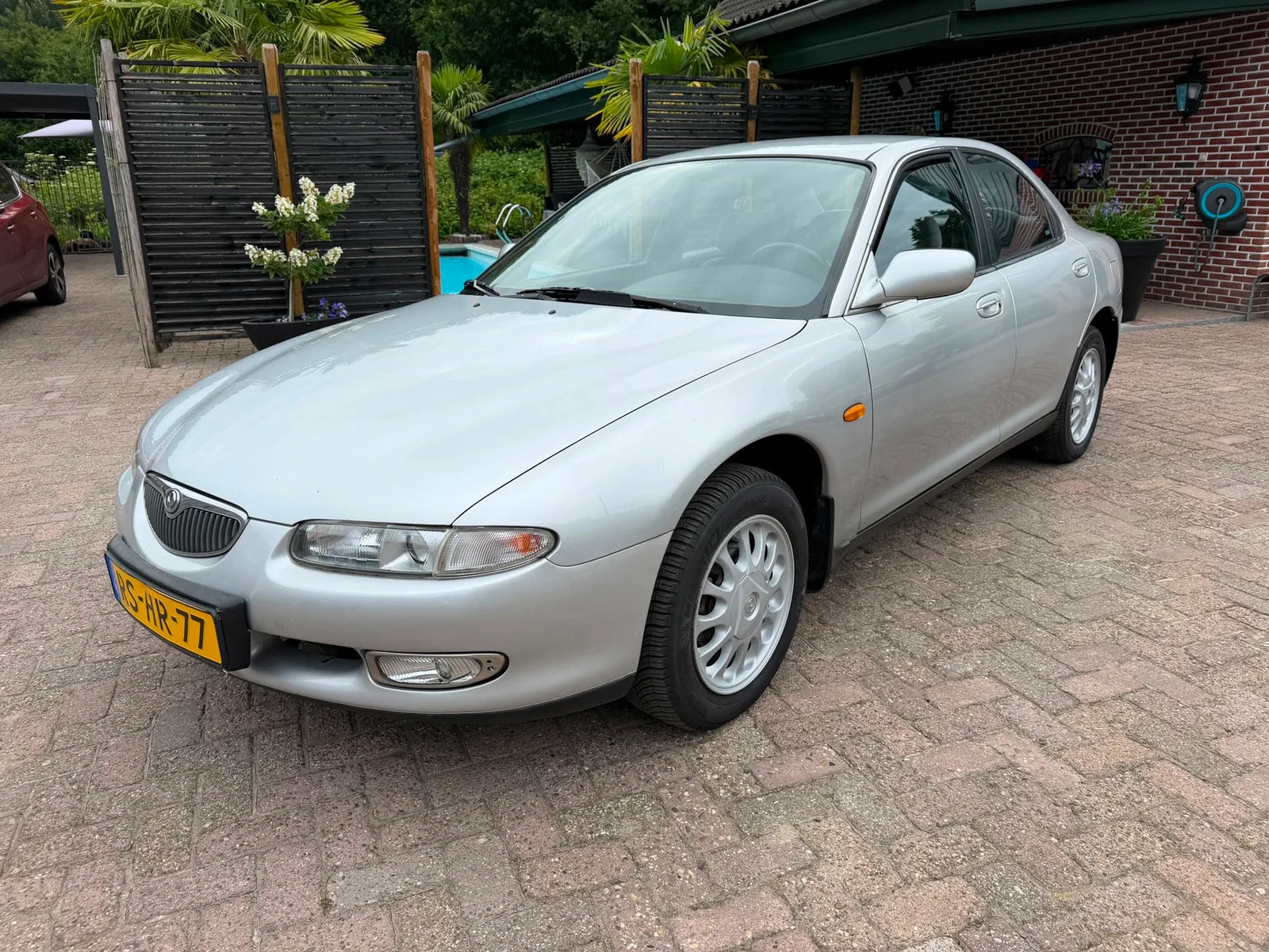 Mazda 6-serie (1997) — foto 1