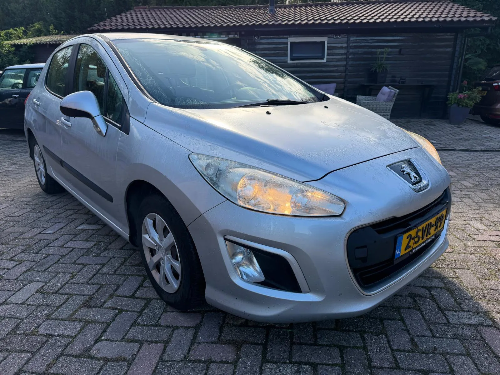 Peugeot 308 (2012) — foto 1