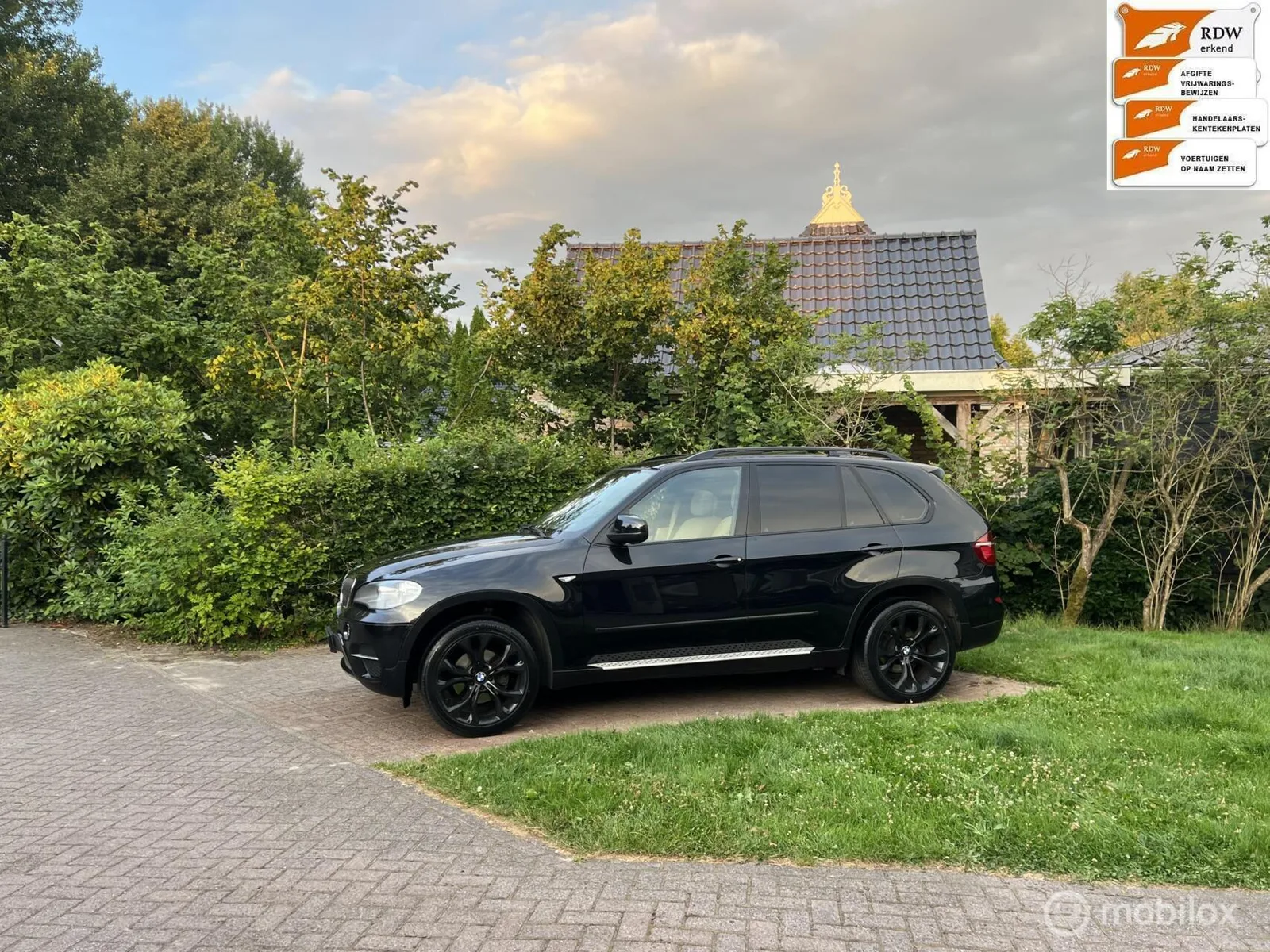 BMW X5 (2011) — foto 1