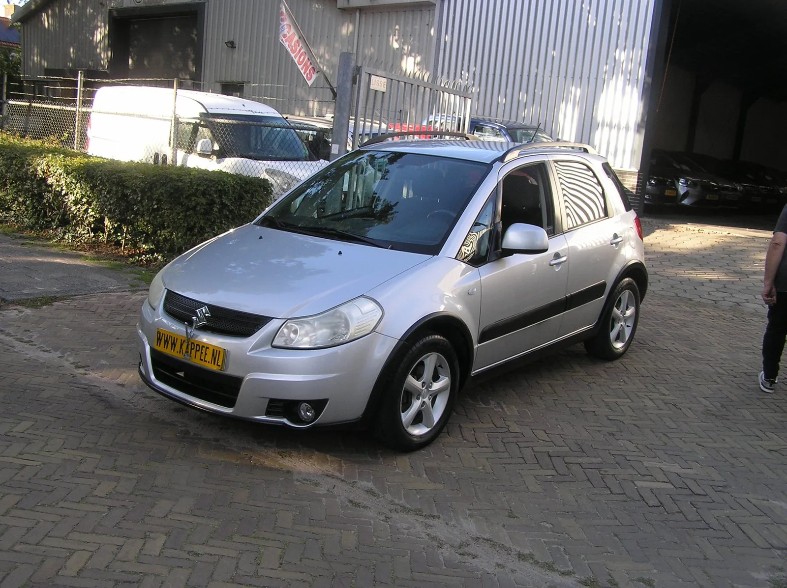 Suzuki SX4 (2008) — foto 1