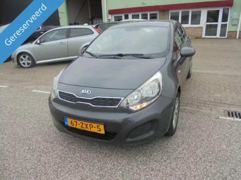 Kia Rio (2013) — foto 1