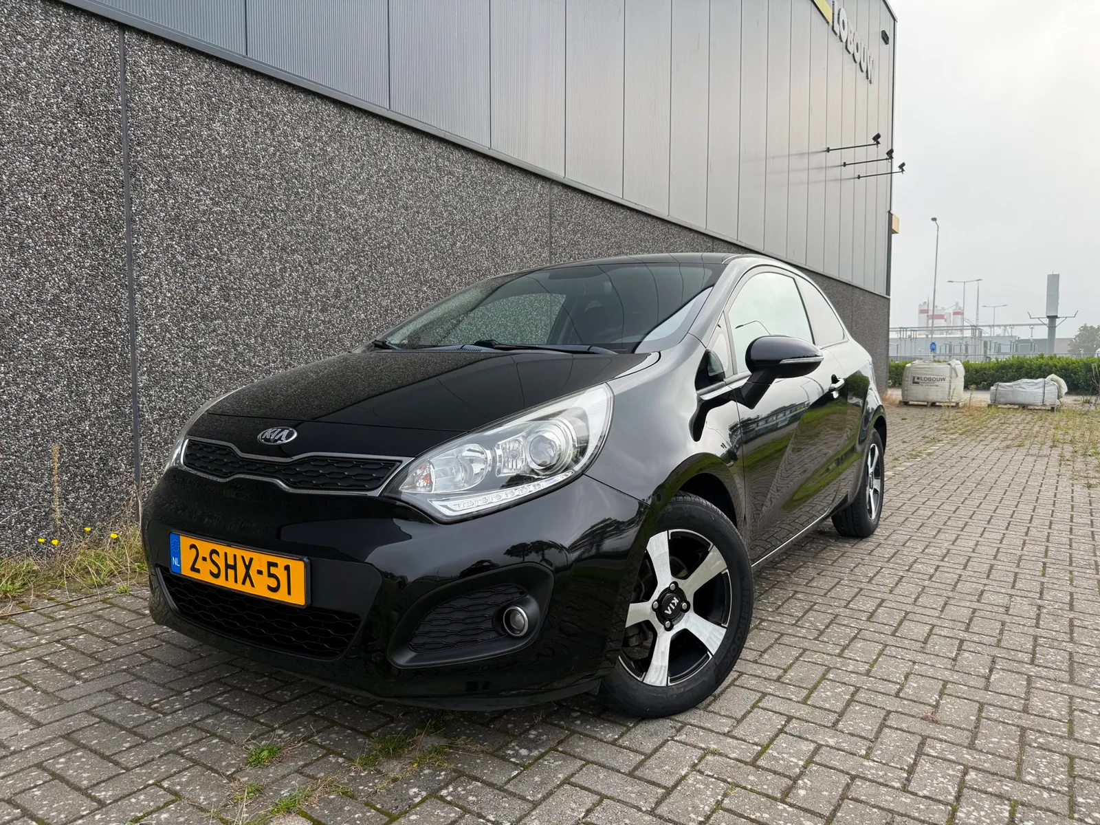 Kia Rio (2014) — foto 1