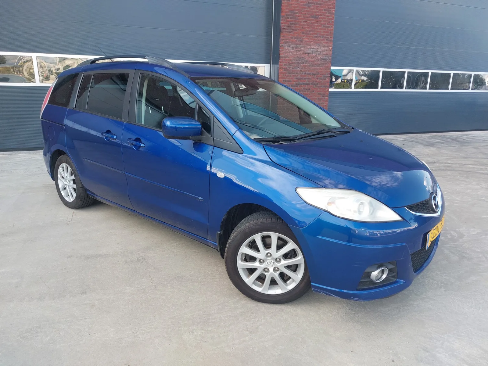 Mazda 5 (2009) — foto 1