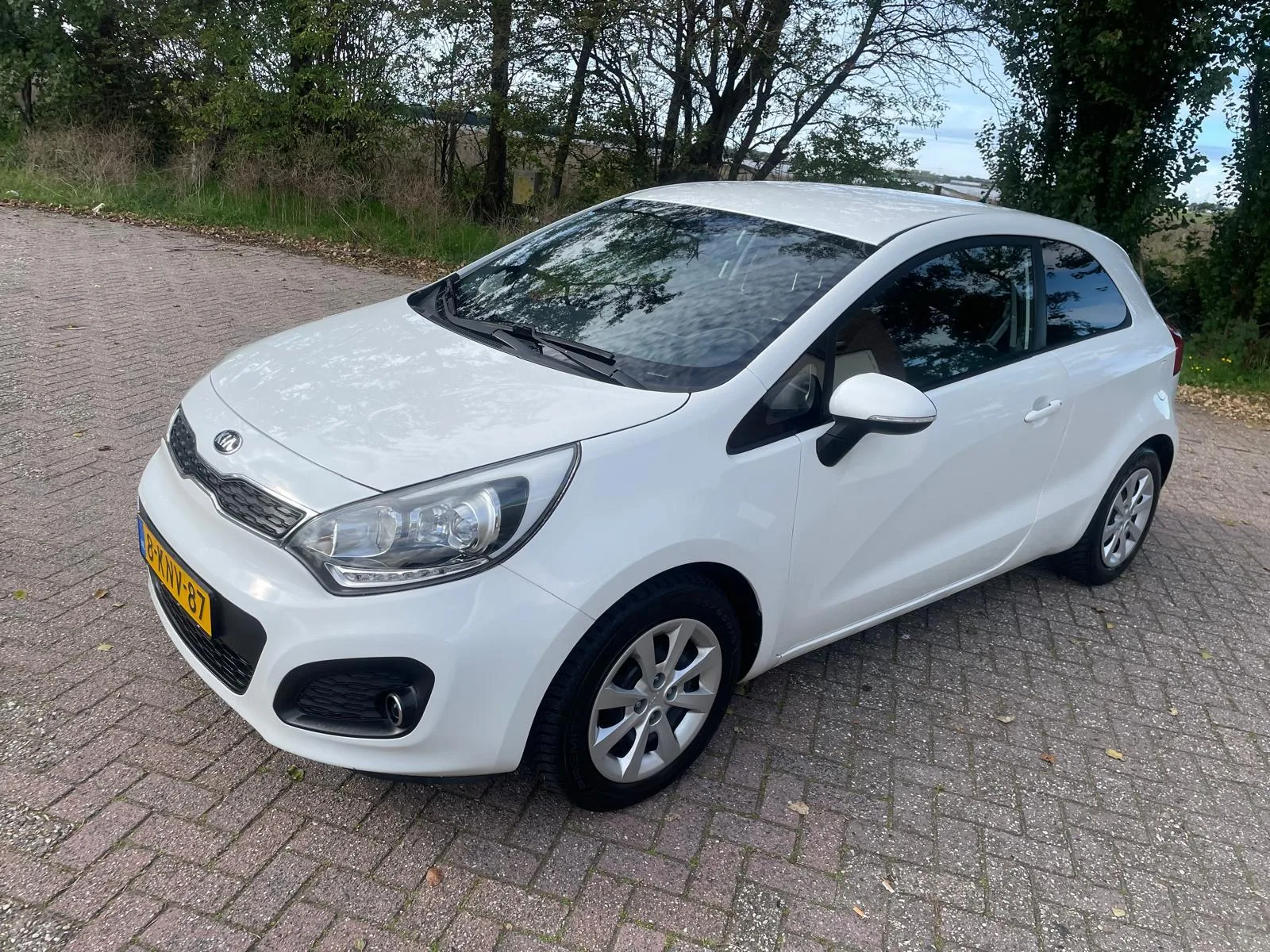 Kia Rio (2013) — foto 1