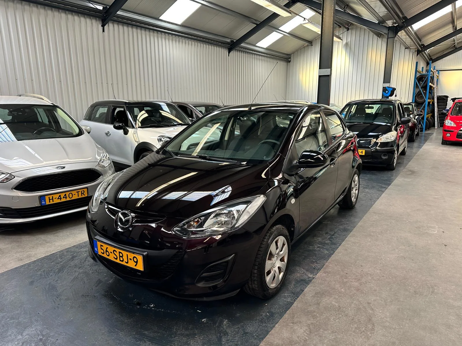 Mazda 2 (2011) — foto 1