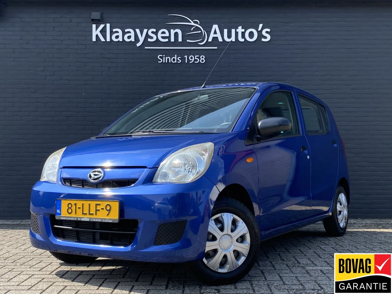 Daihatsu Cuore (2010) — foto 1