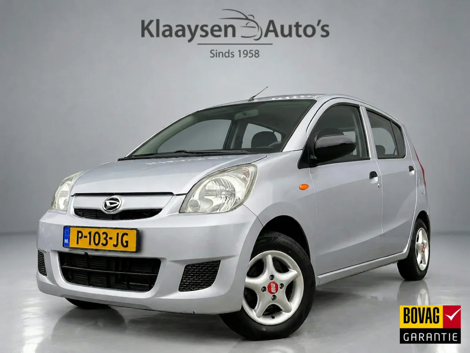 Daihatsu Cuore (2009) — foto 1