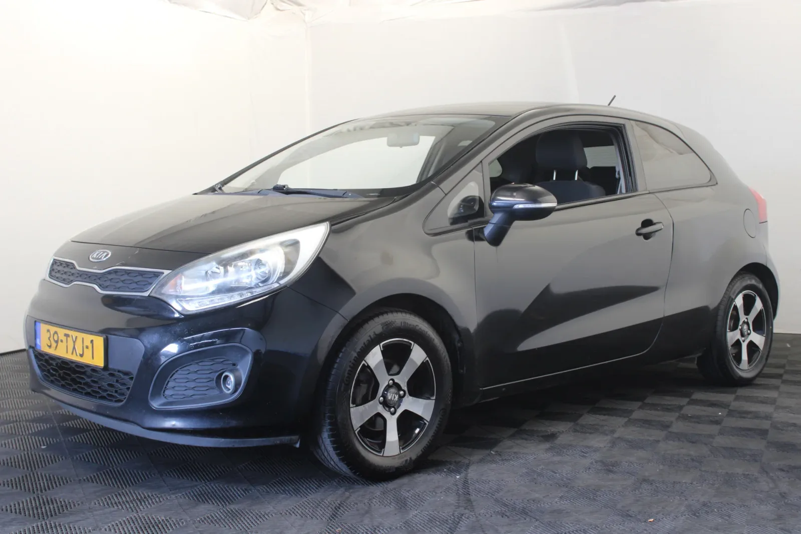 Kia Rio (2012) — foto 1