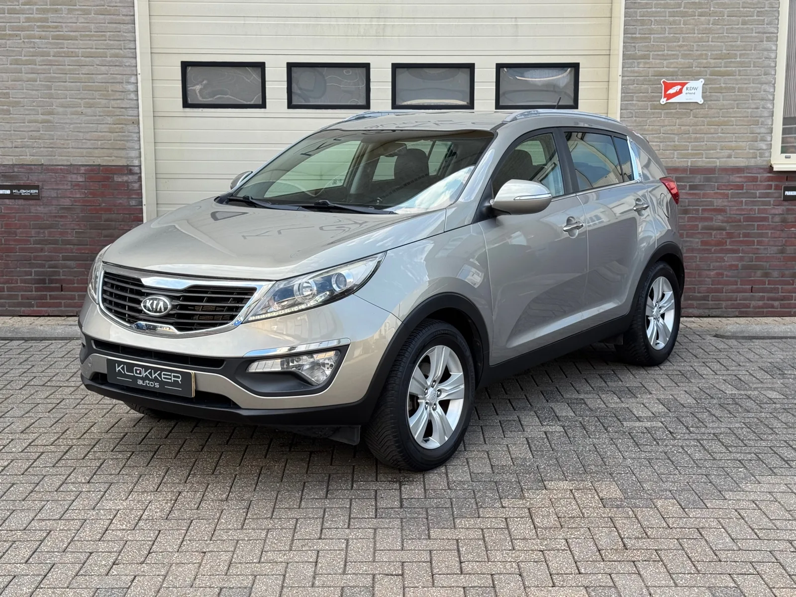 Kia Sportage (2011) — foto 1