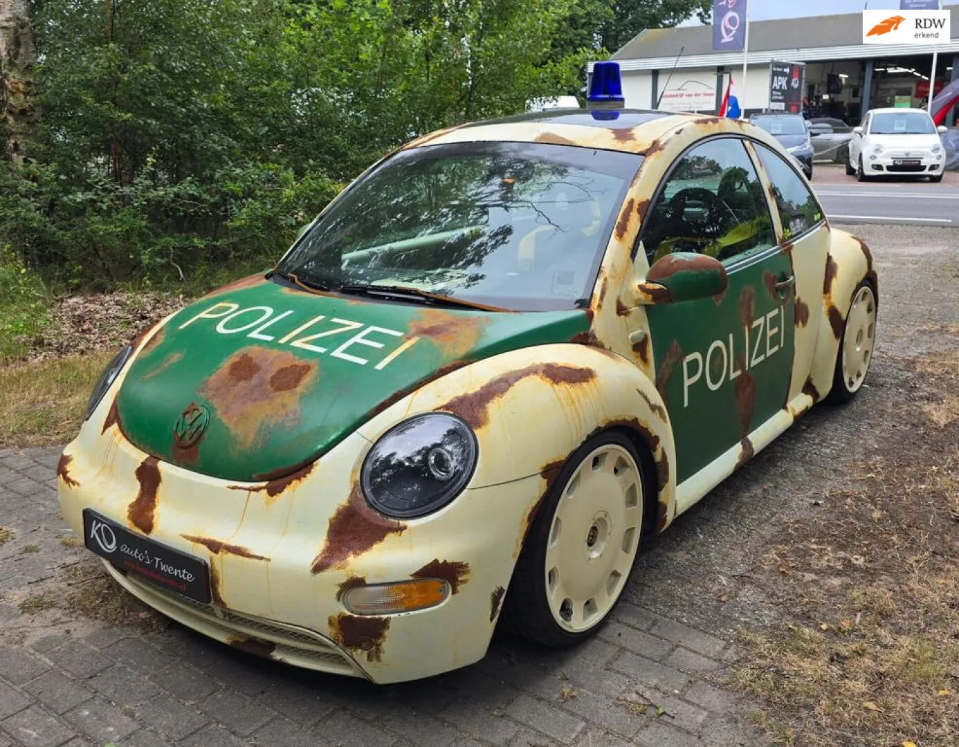 Volkswagen New Beetle (2001) — foto 1