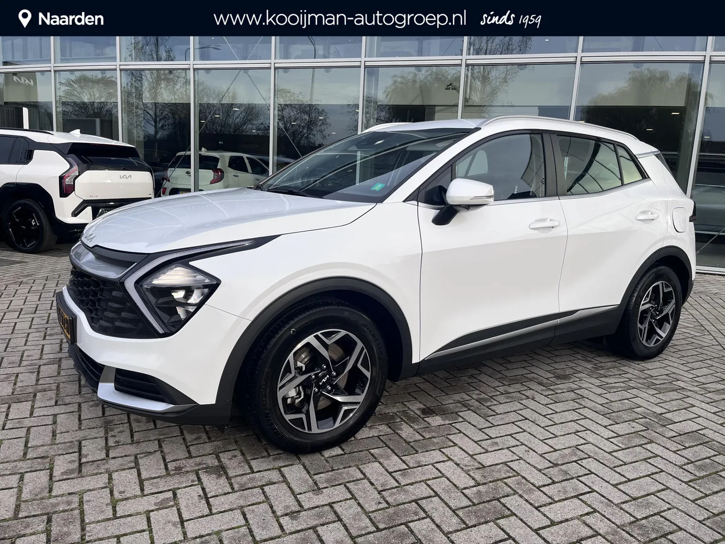 Kia Sportage (2024) — foto 1