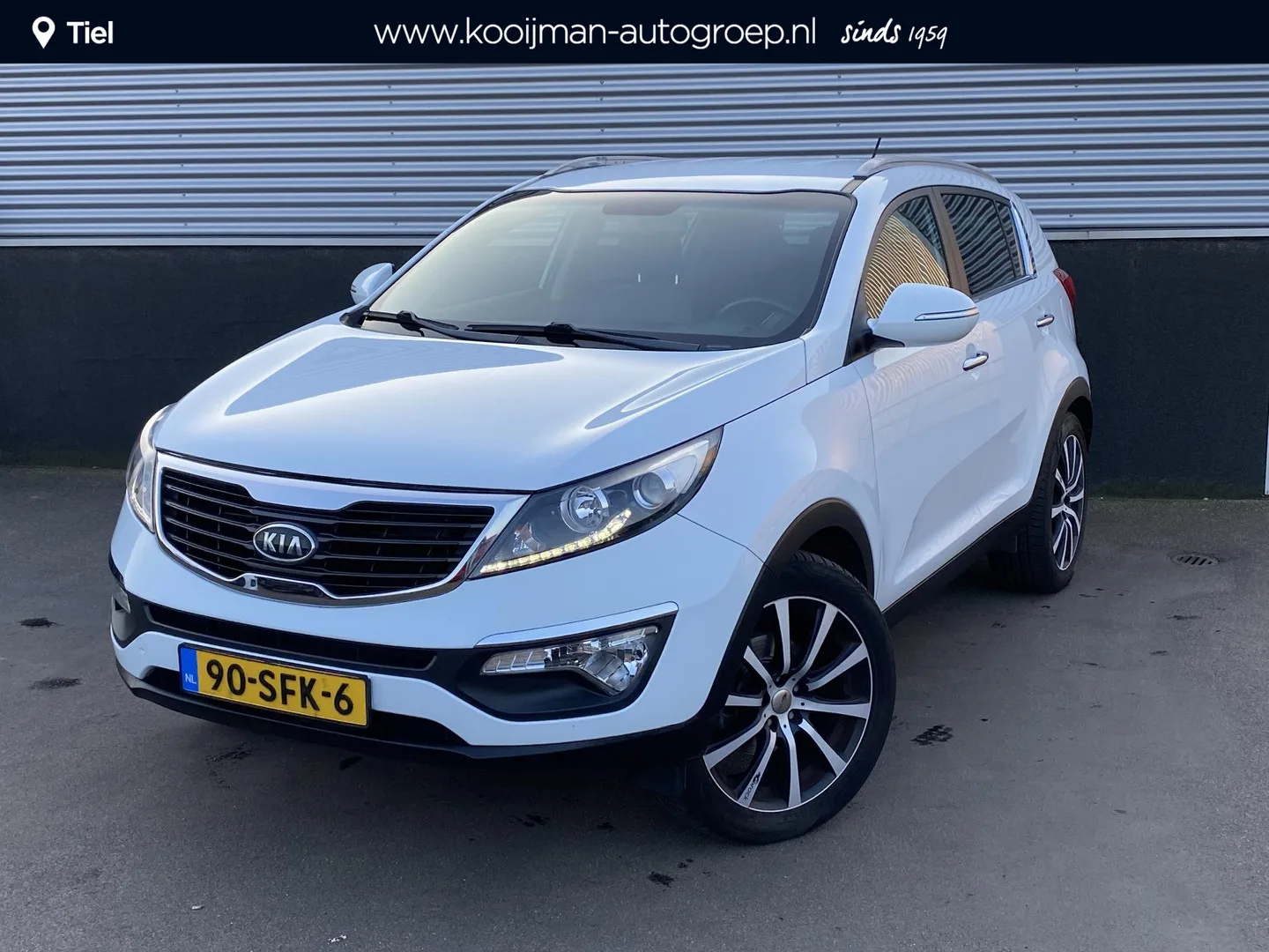Kia Sportage (2011) — foto 1