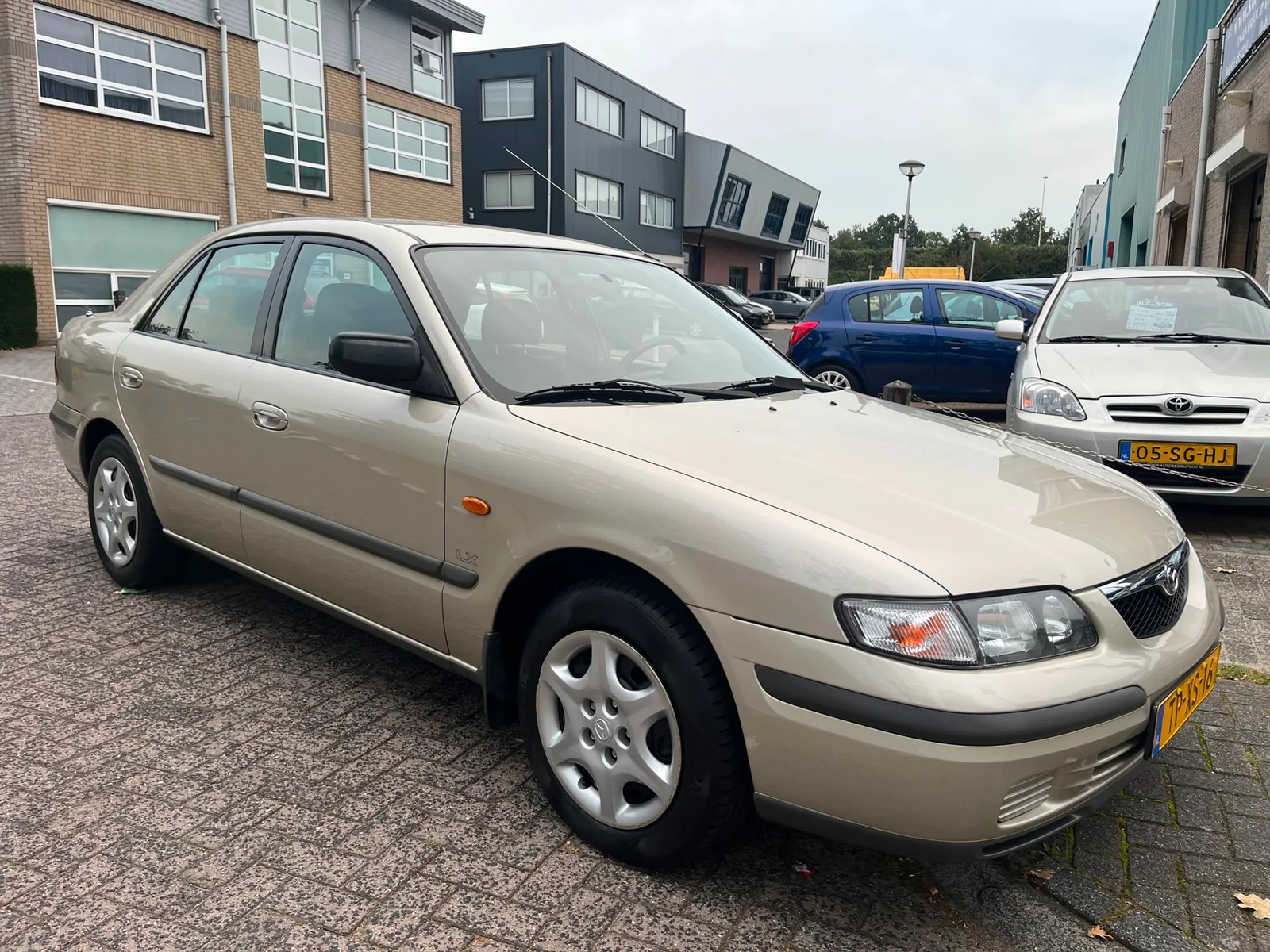 Mazda 626 (1998) — foto 1
