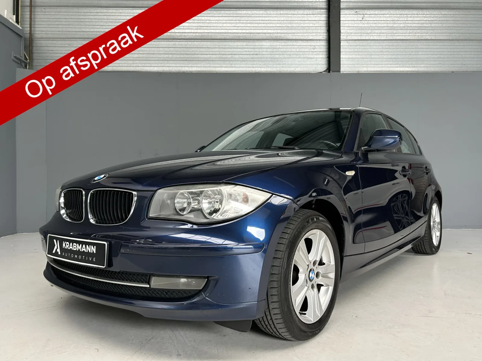 BMW 1-Serie (2009) — foto 1