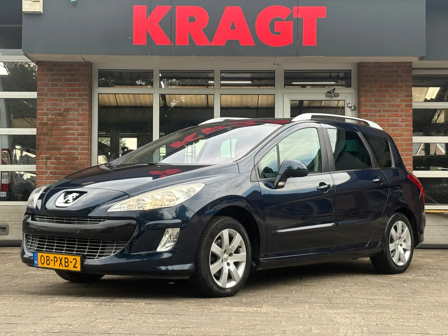 Peugeot 308 (2011) — foto 1