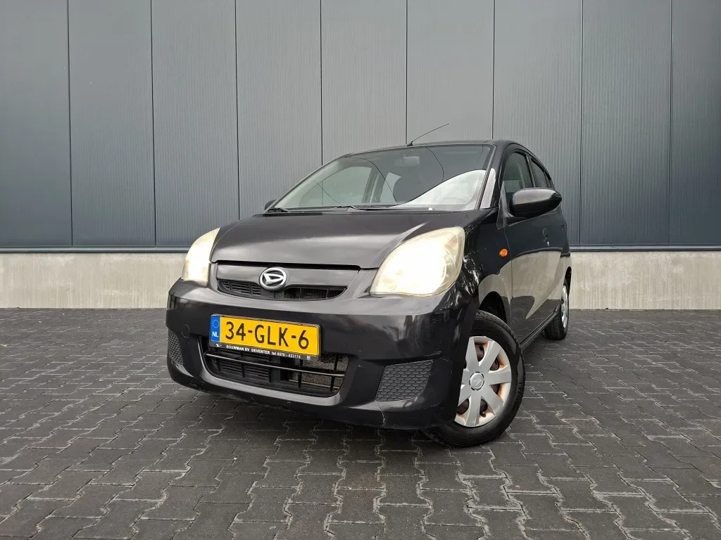 Daihatsu Cuore (2008) — foto 1