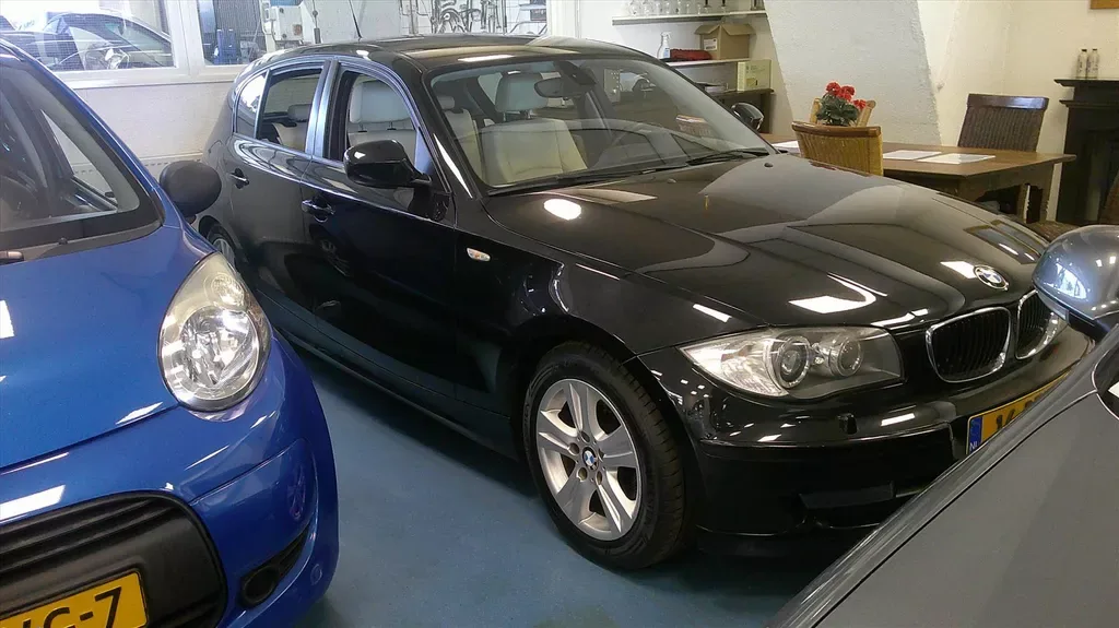 BMW 1-Serie (2011) — foto 1