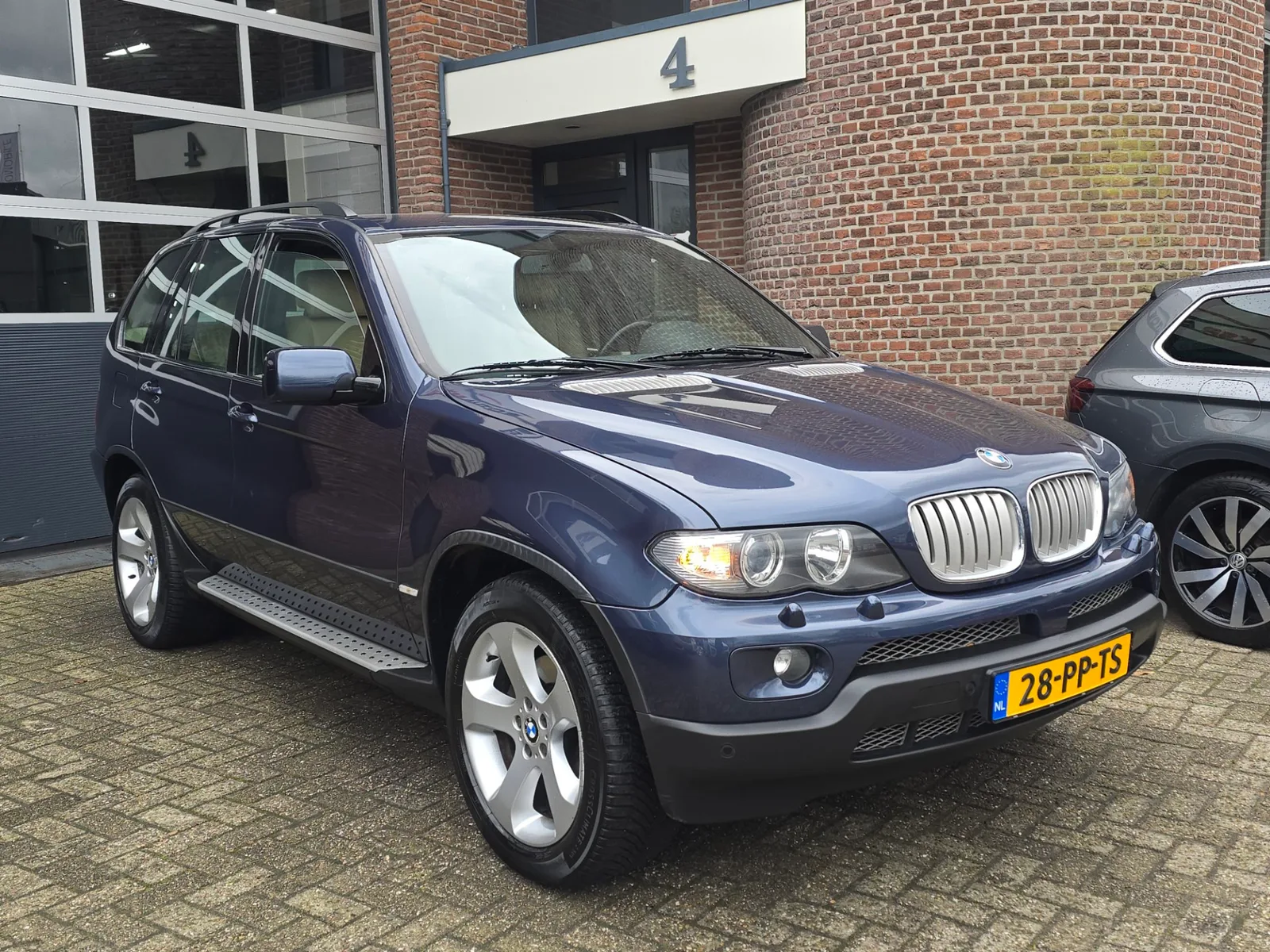 BMW X5 (2004) — foto 1