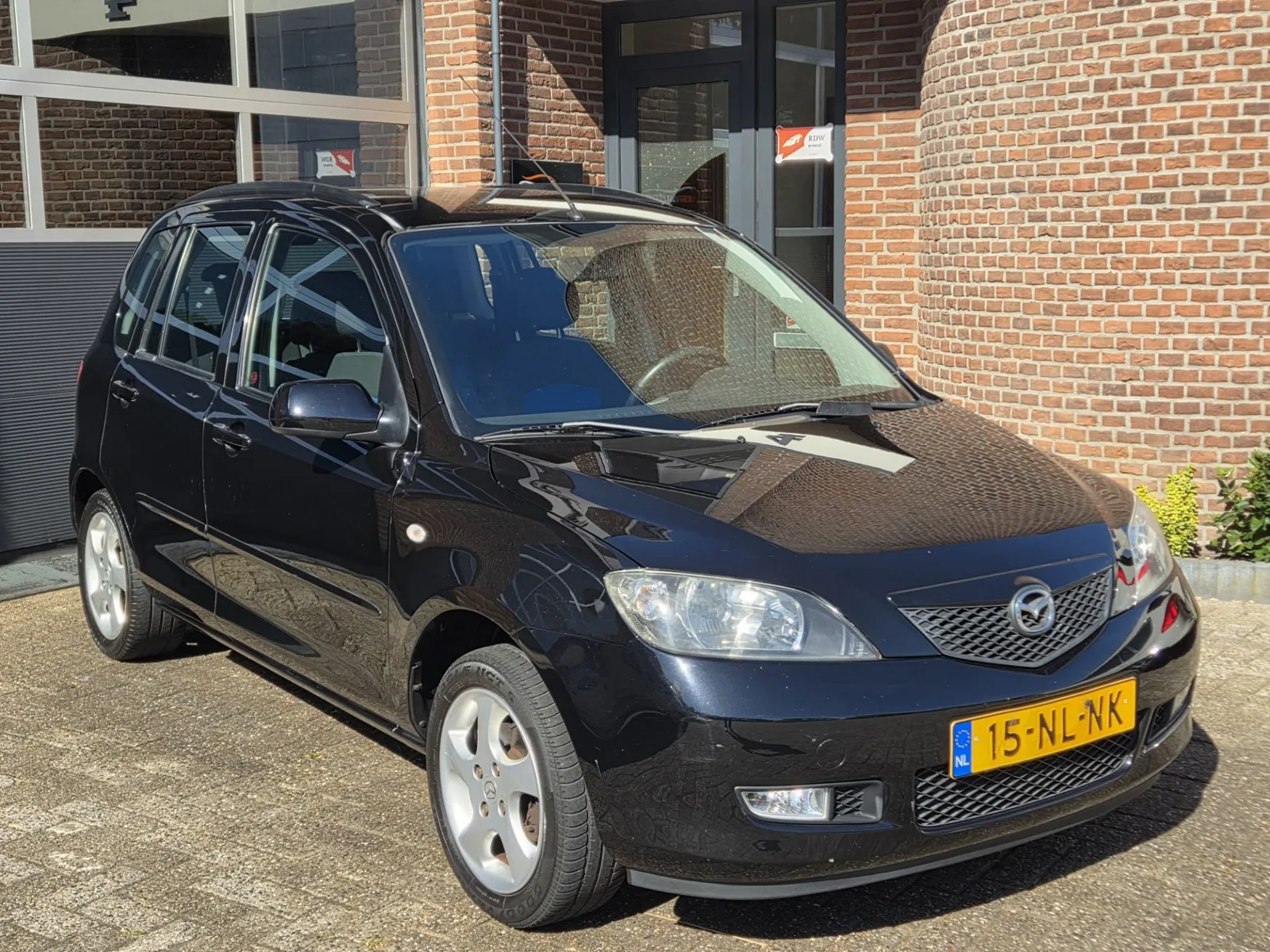 Mazda 2 (2003) — foto 1