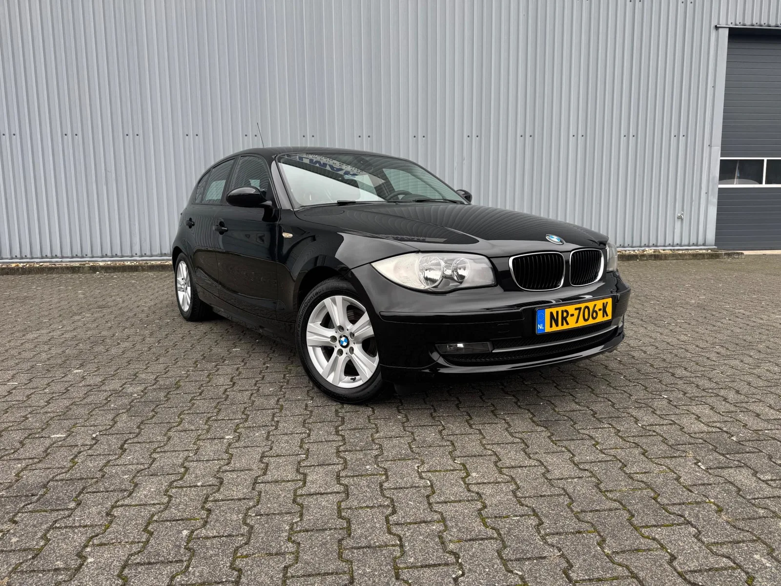 BMW 1-Serie (2009) — foto 1