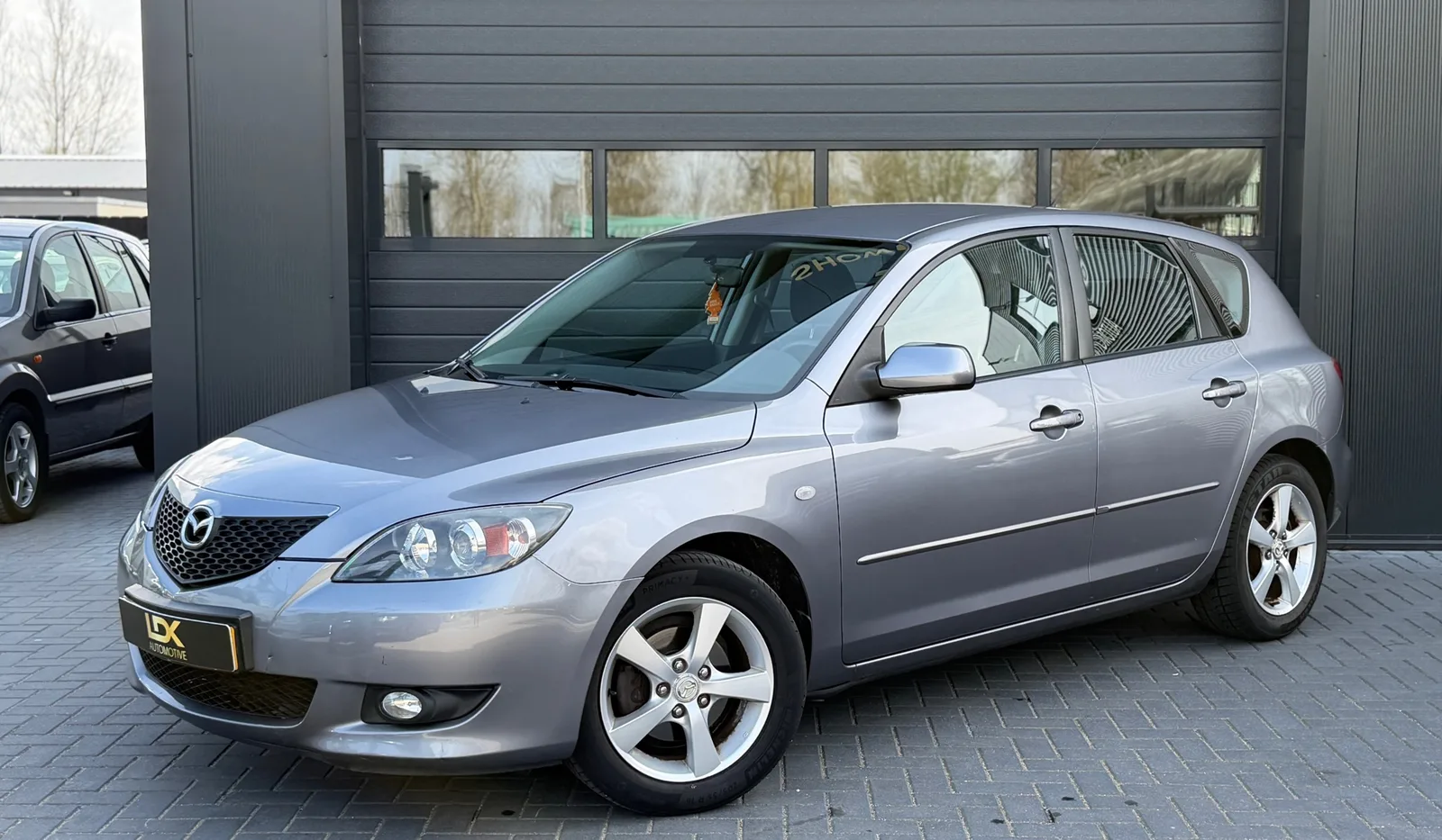Mazda 3 (2005) — foto 1