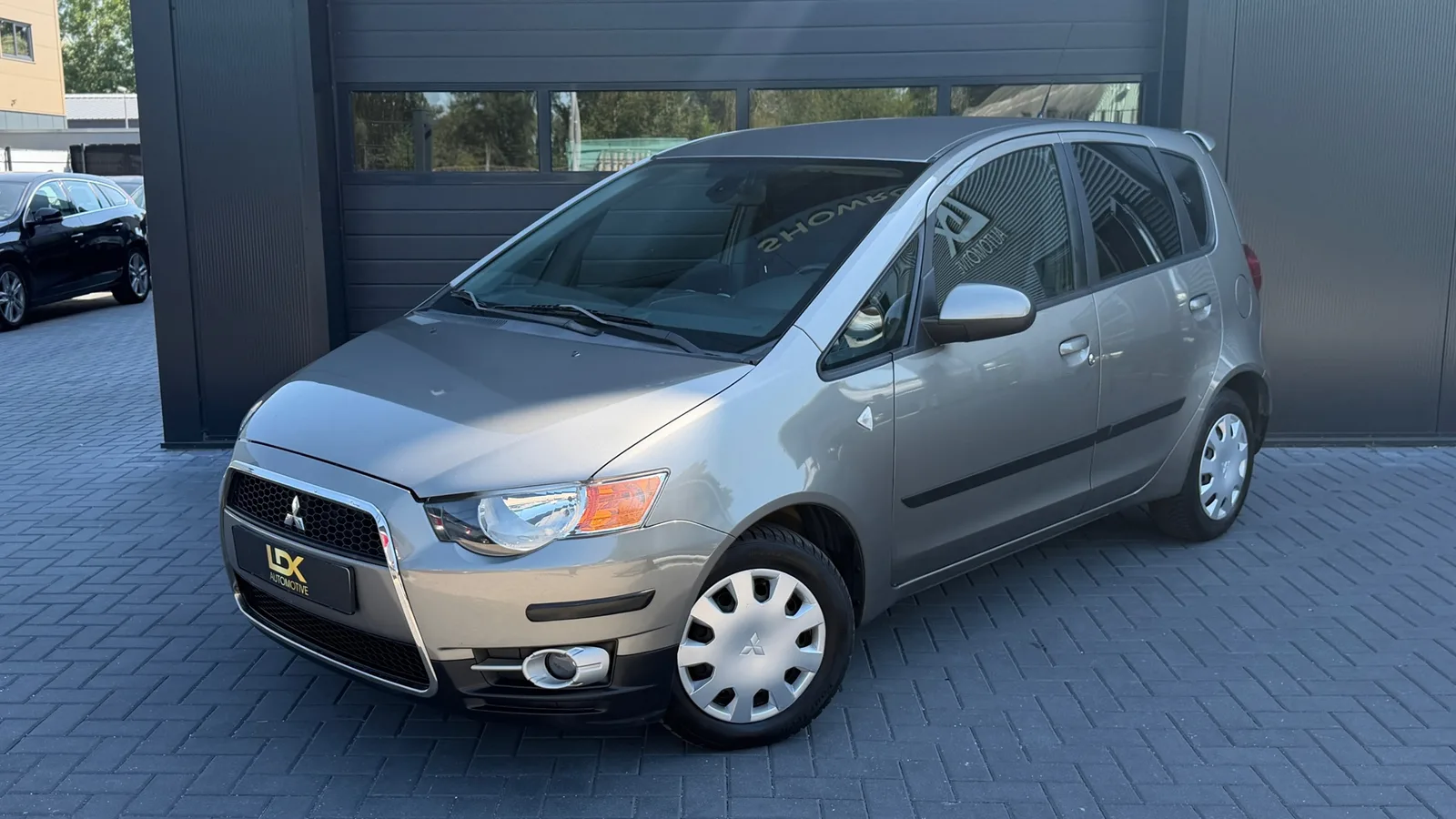 Mitsubishi Colt (2011) — foto 1