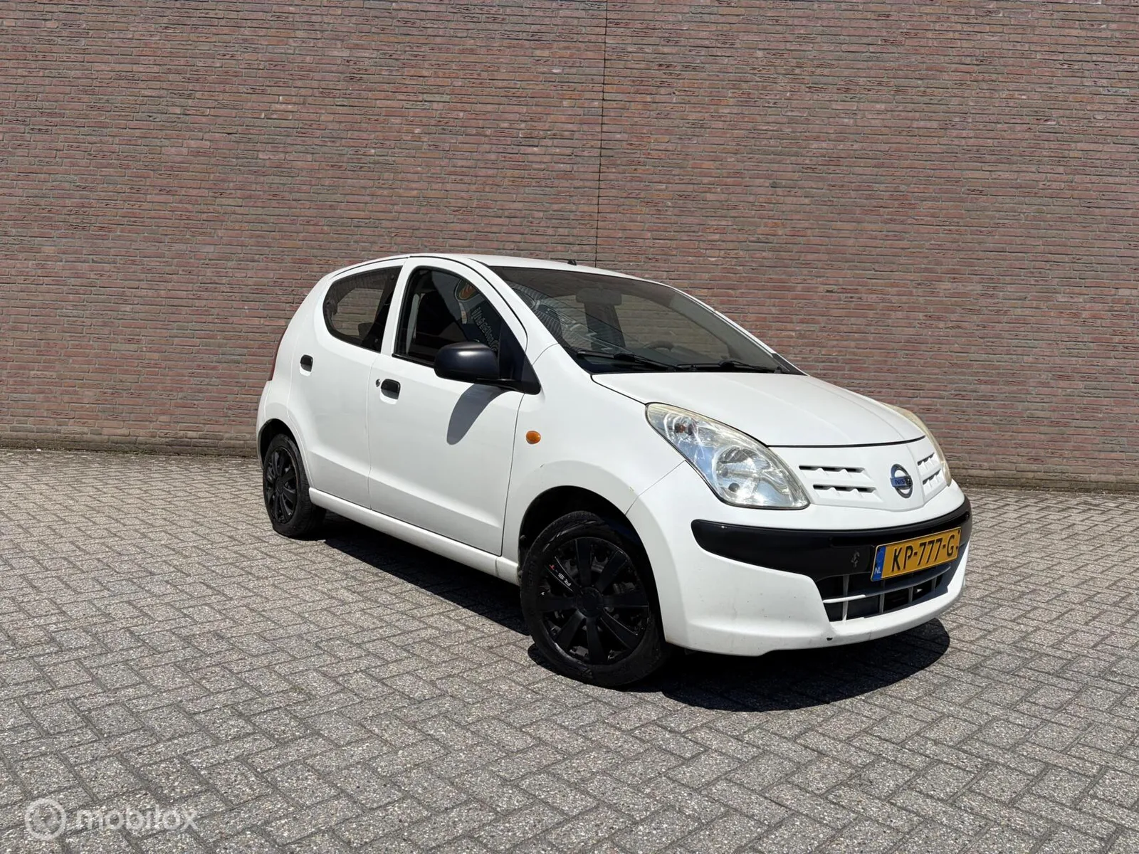 Nissan Pixo (2011) — foto 1