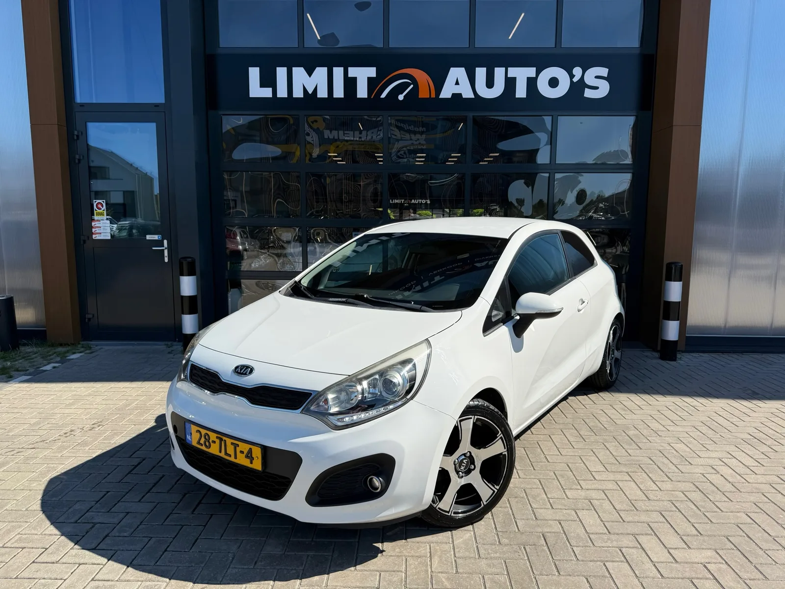 Kia Rio (2012) — foto 1