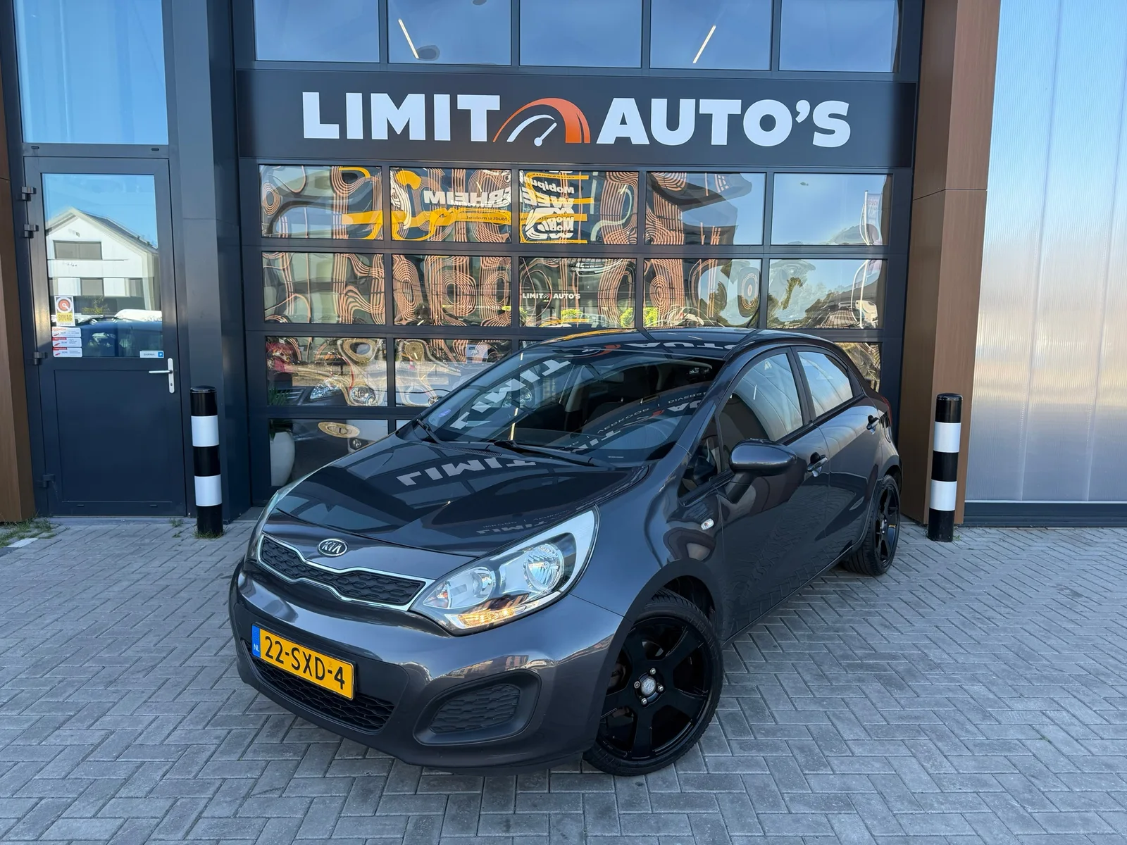 Kia Rio (2012) — foto 1