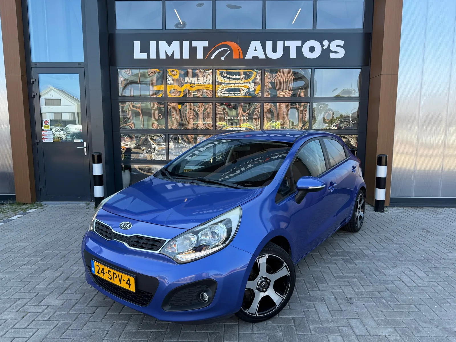 Kia Rio (2012) — foto 1