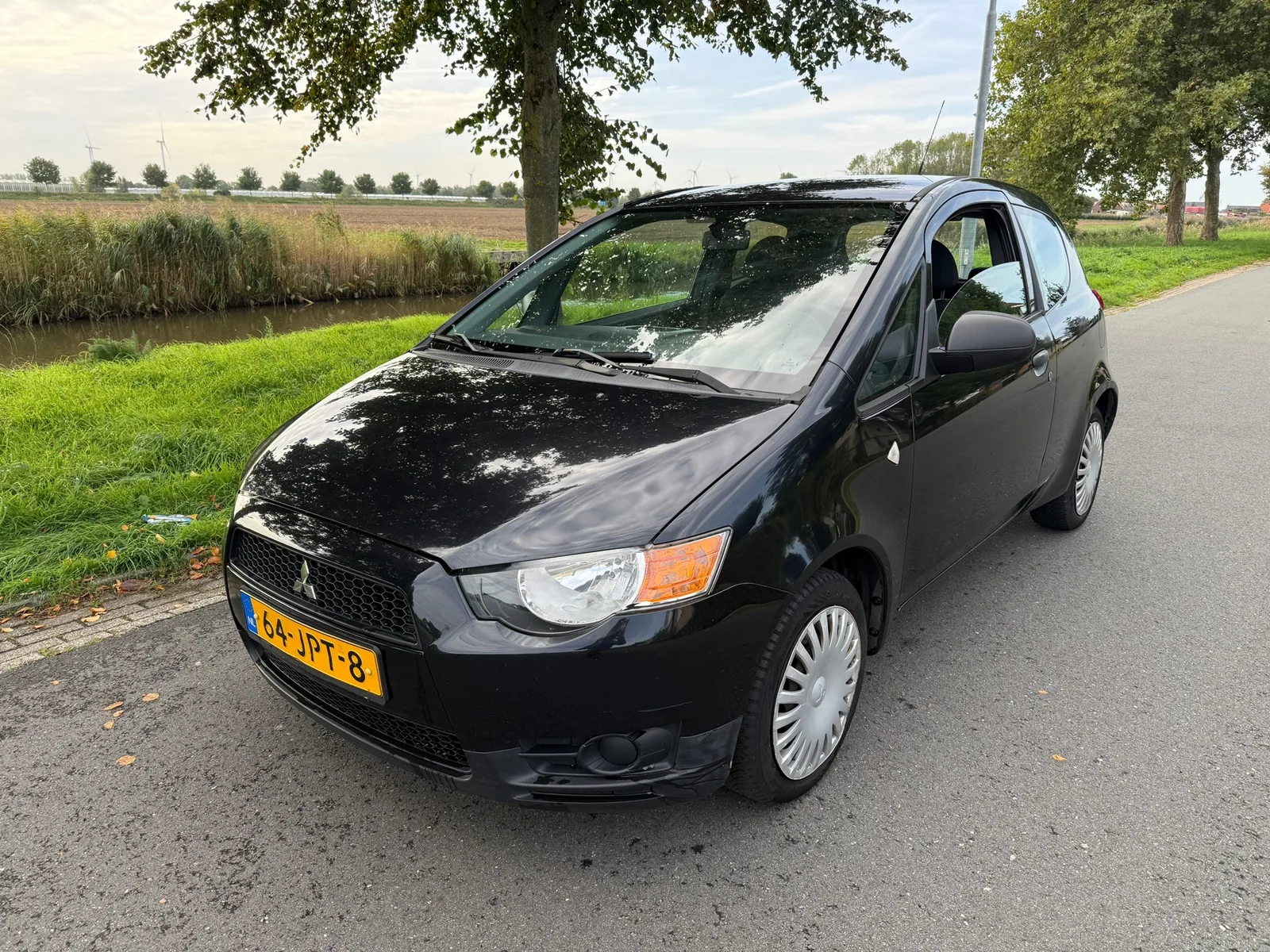 Mitsubishi Colt (2009) — foto 1