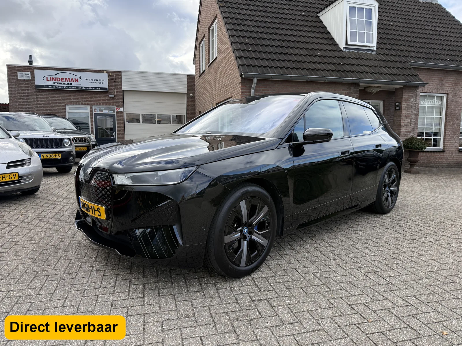 BMW iX (2025) — foto 1