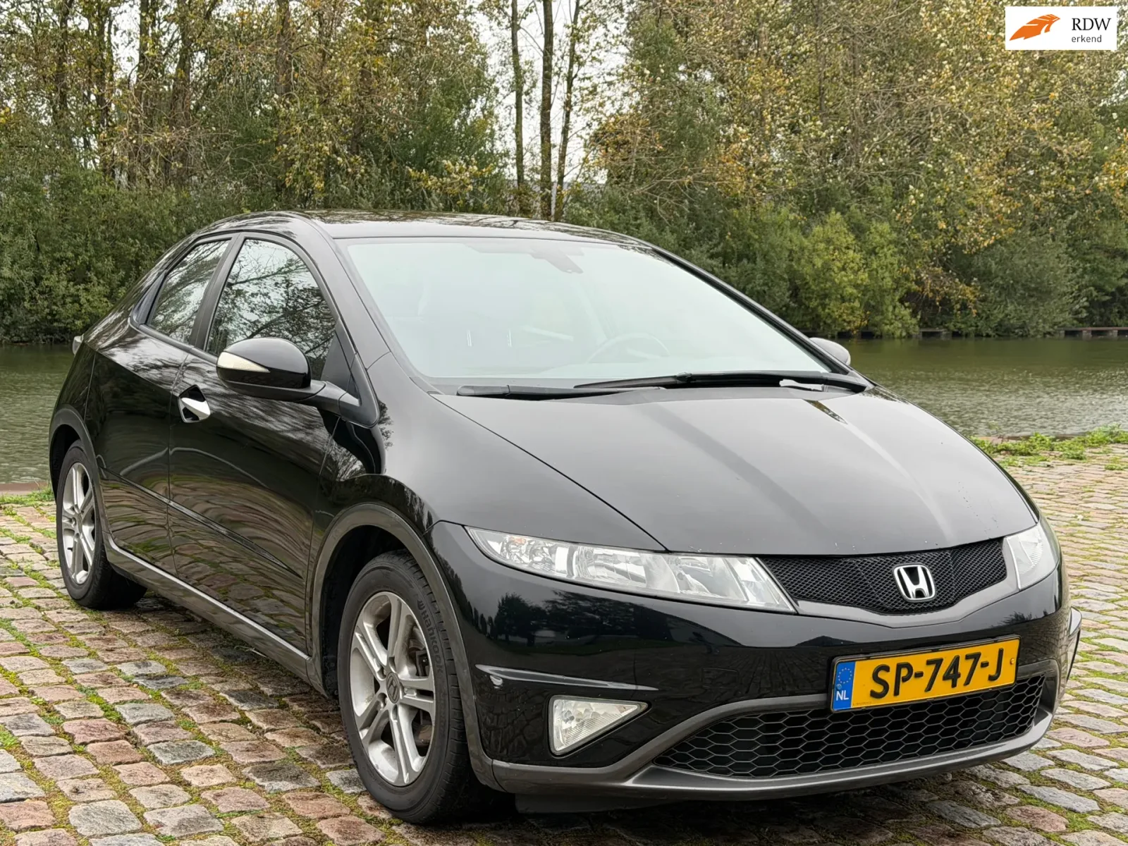 Honda Civic (2011) — foto 1