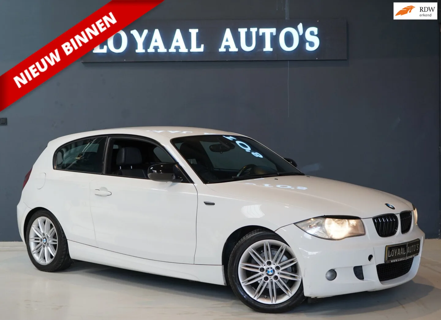 BMW 1-Serie (2010) — foto 1