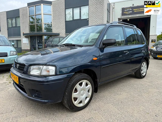 Mazda Demio (2000) — foto 1
