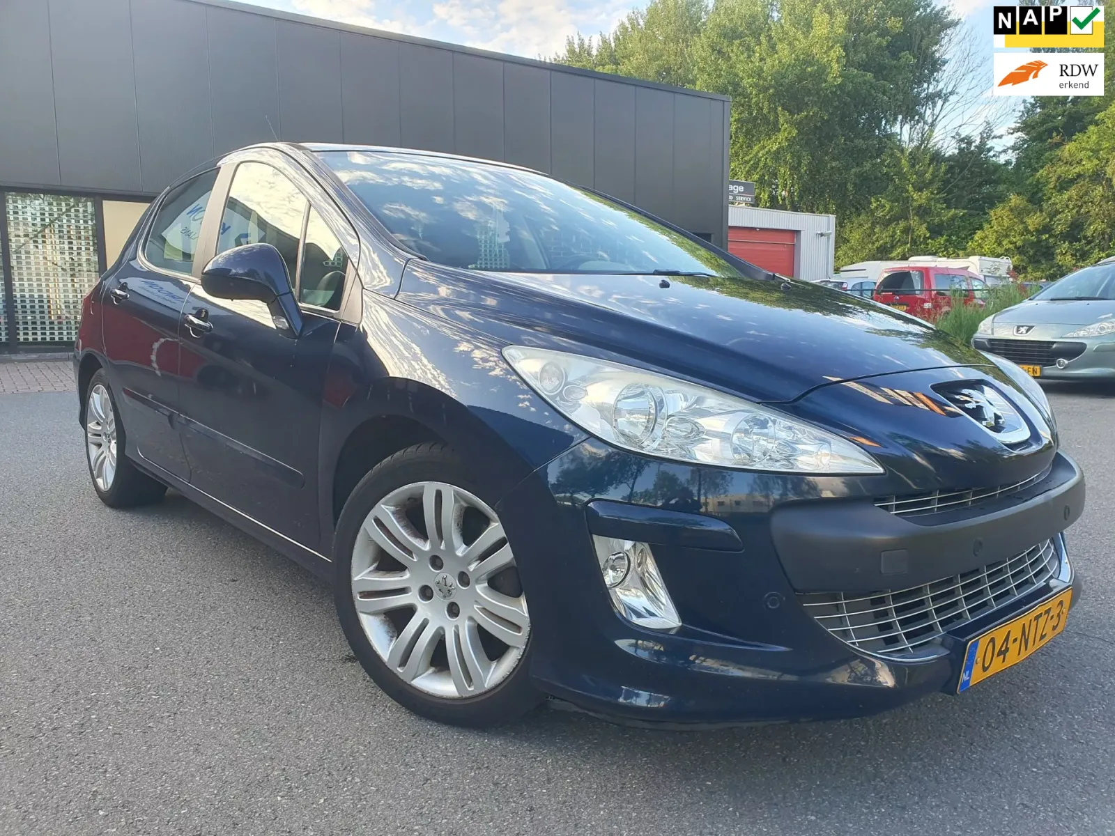 Peugeot 308 (2010) — foto 1