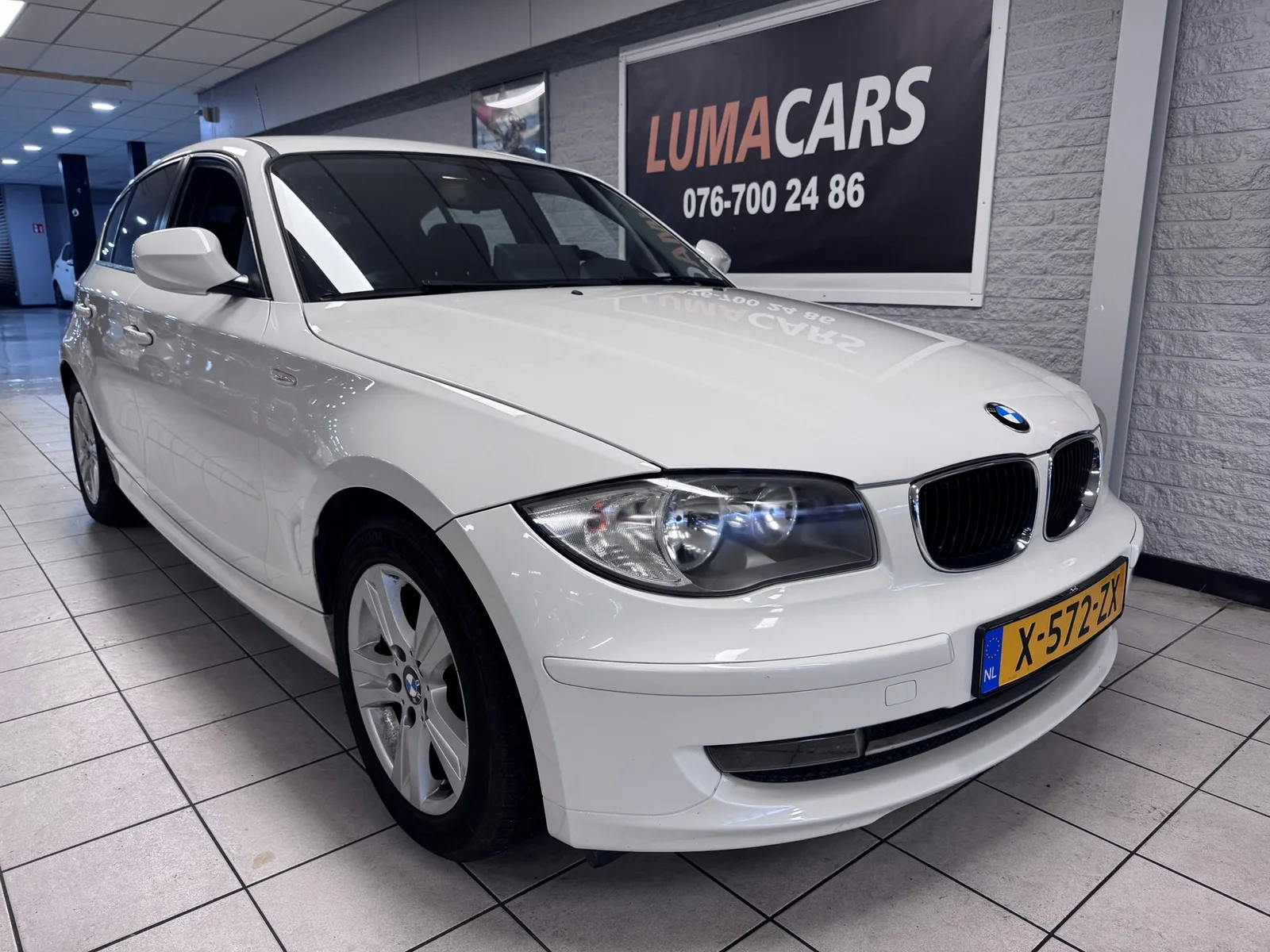 BMW 1-Serie (2010) — foto 1