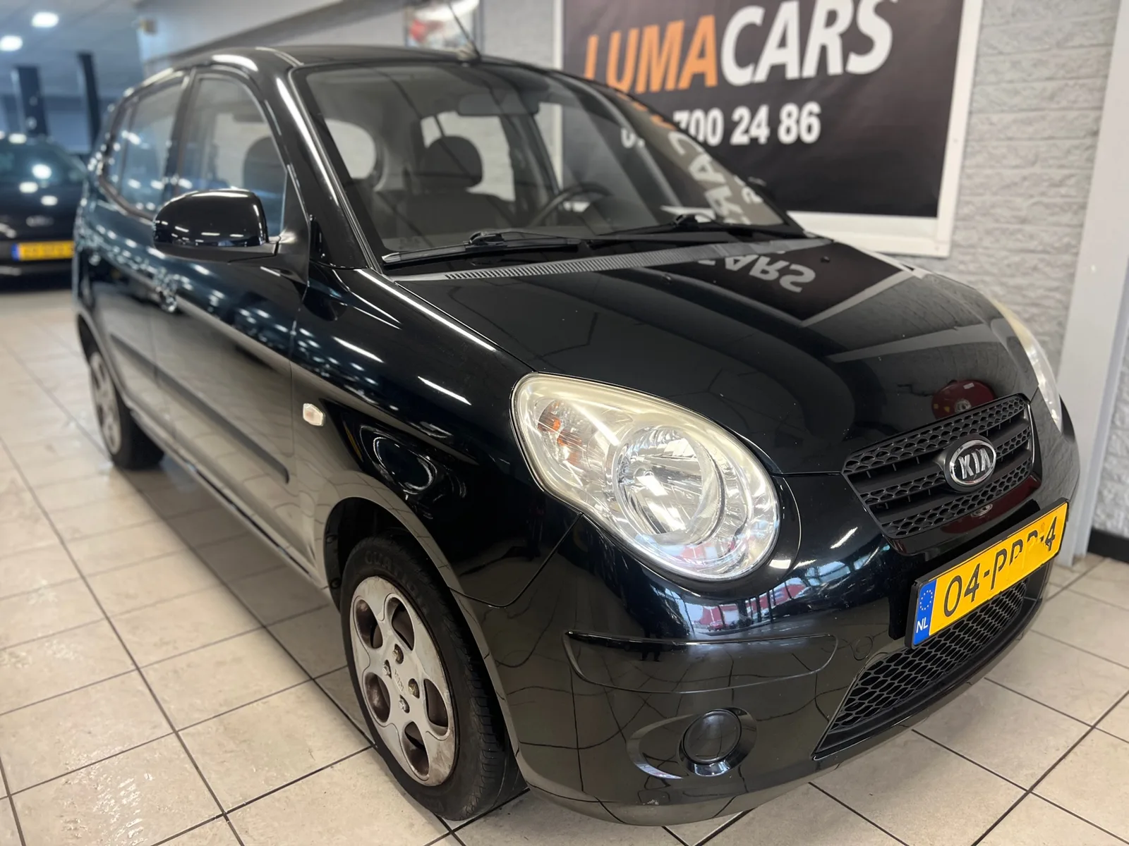Kia Picanto (2011) — foto 1