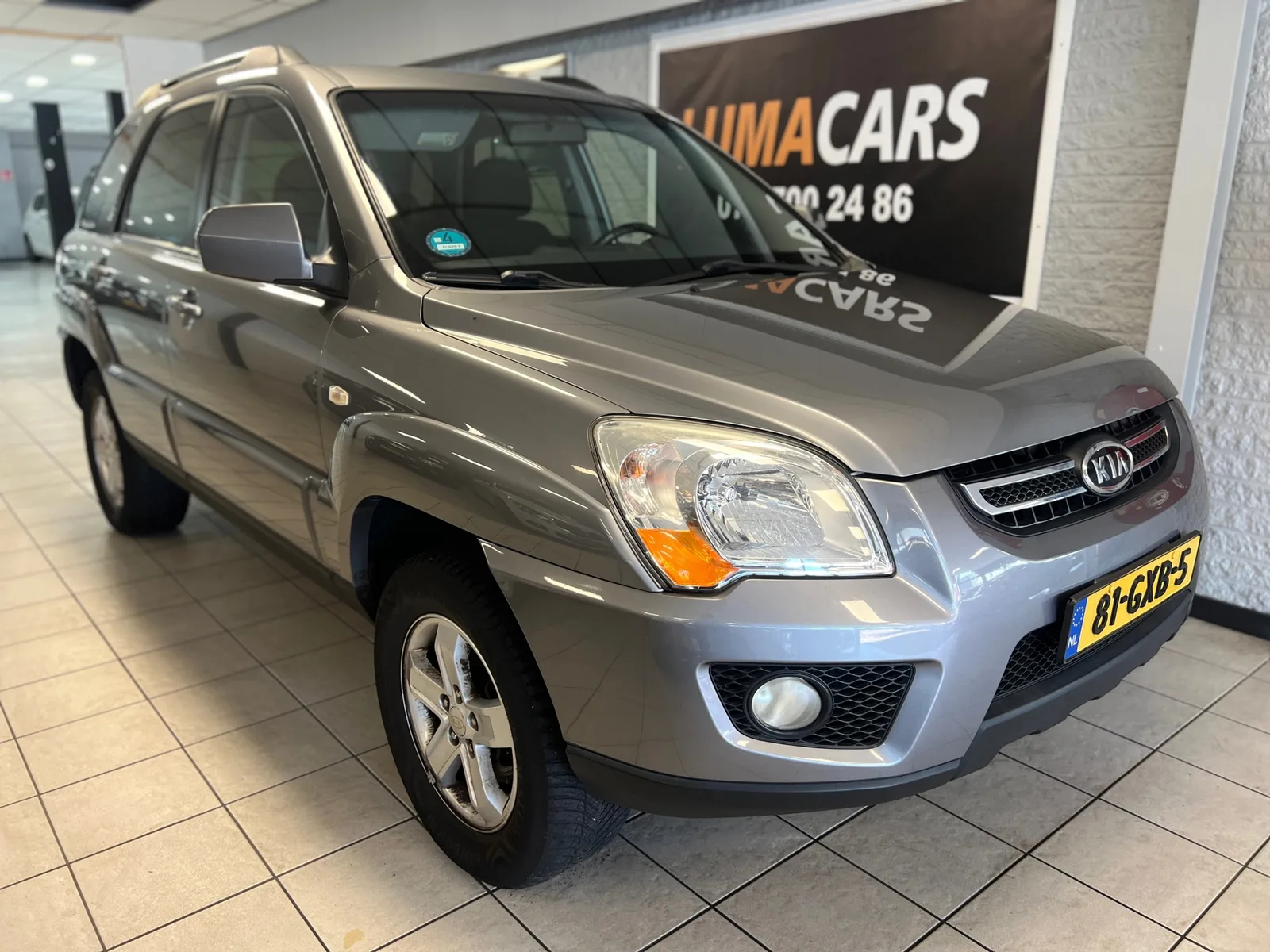 Kia Sportage (2008) — foto 1