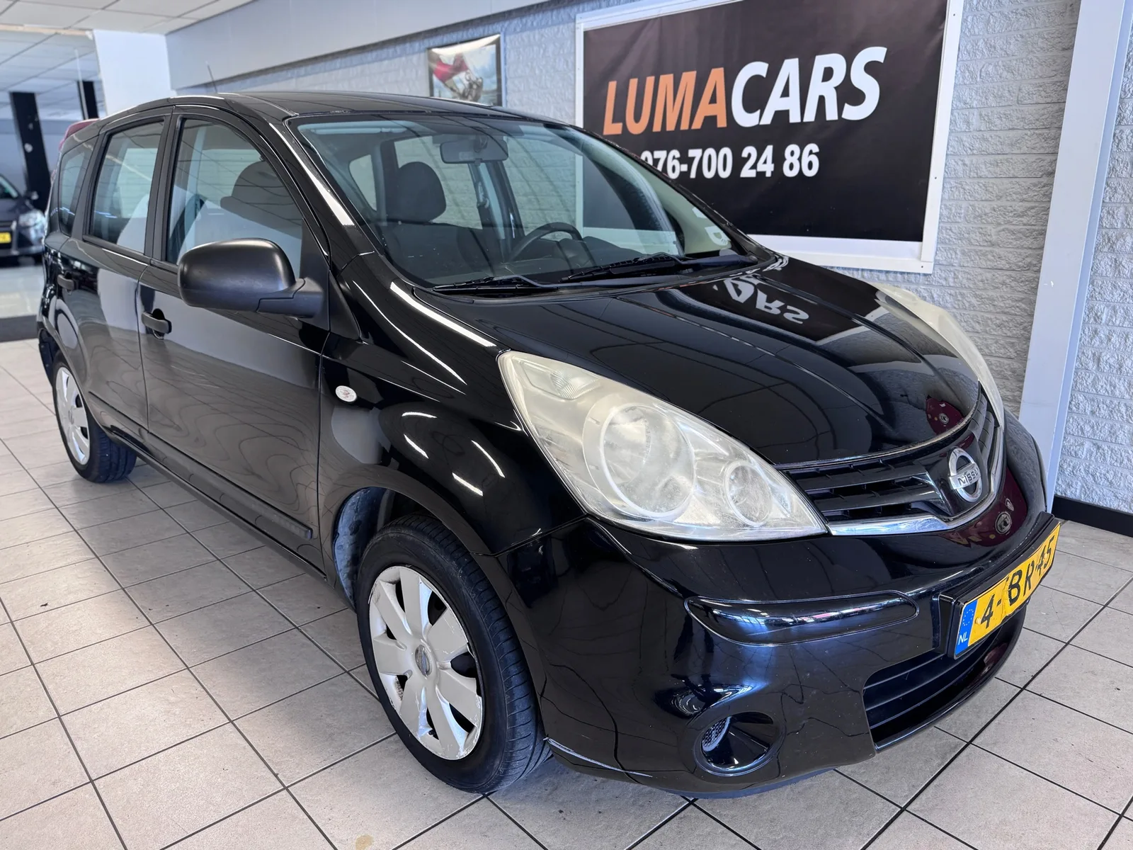 Nissan Note (2011) — foto 1