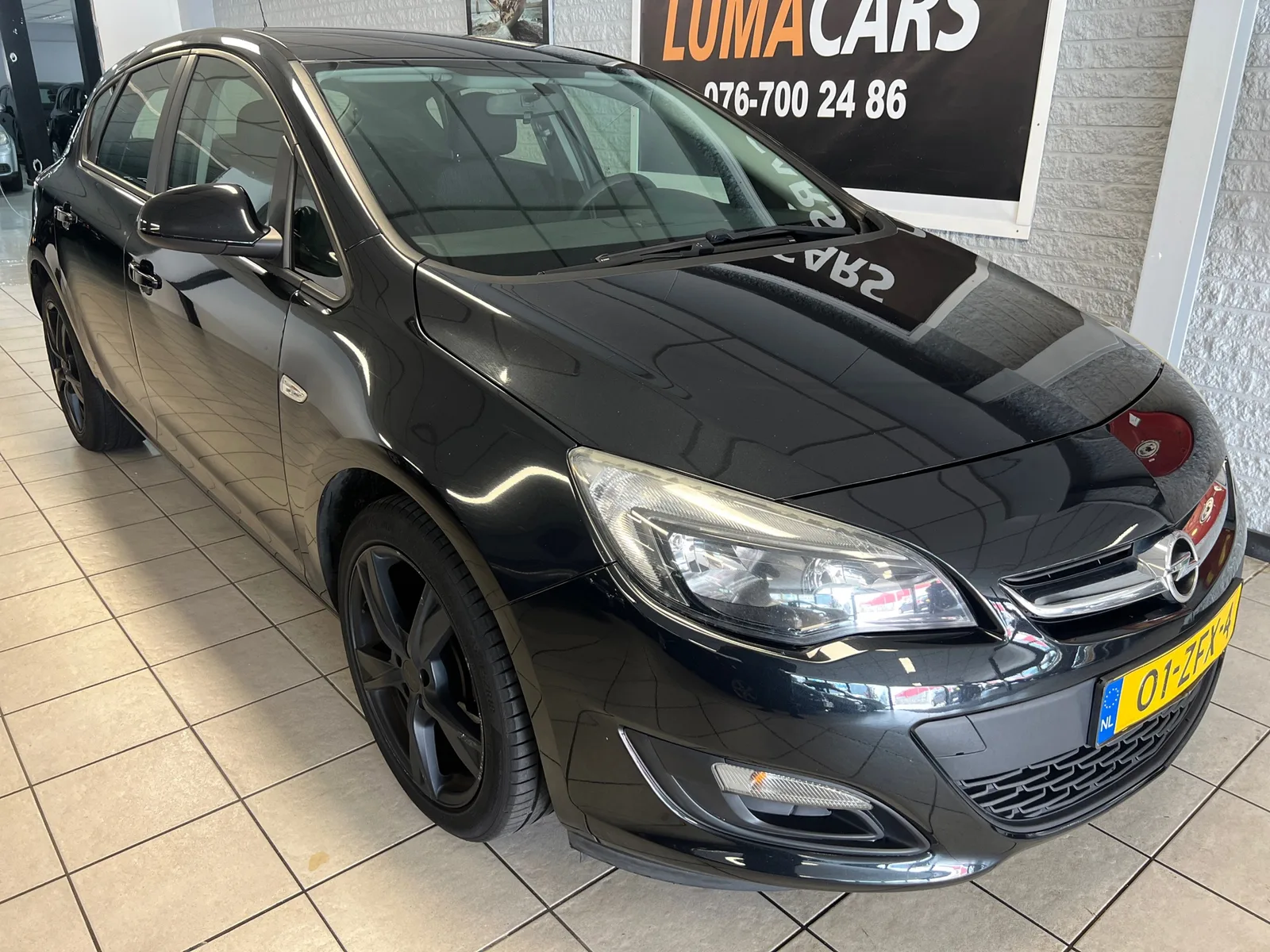 Opel Astra (2012) — foto 1